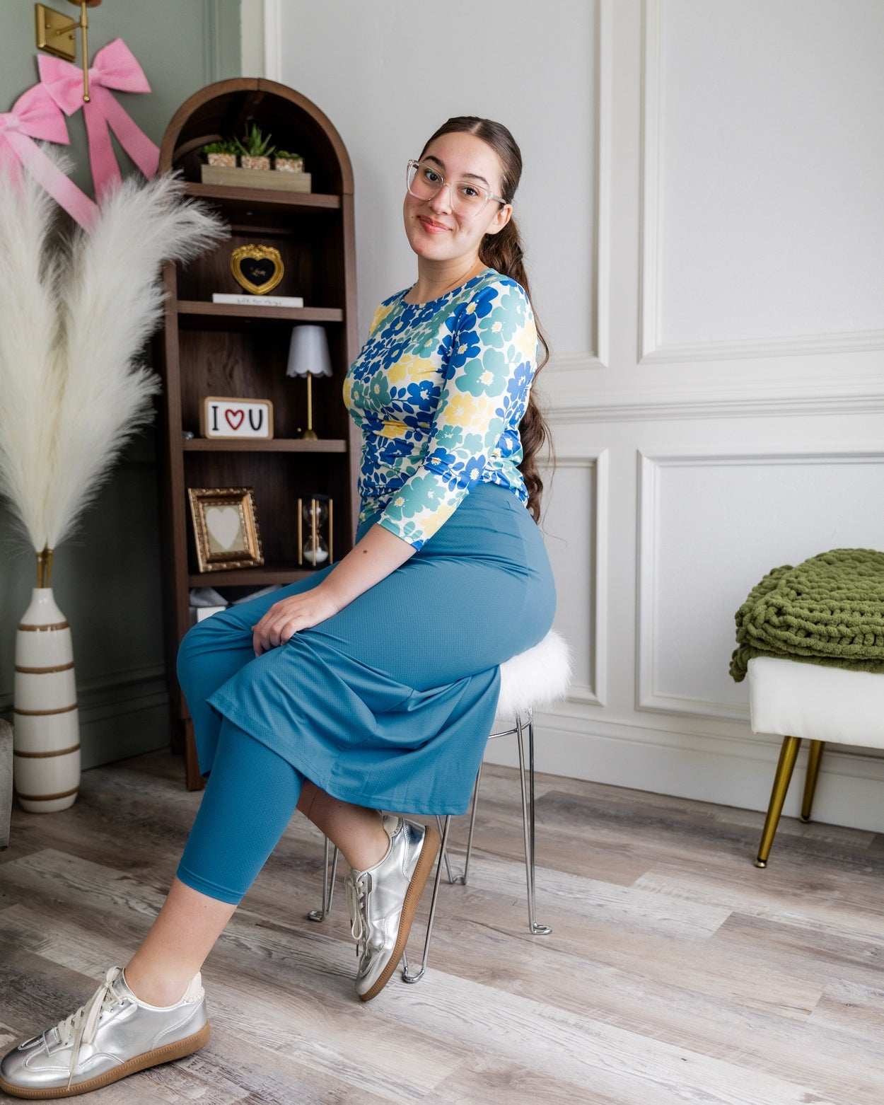 Model wearing Nuggles® 31" All-Sport Skirt in Turquoise