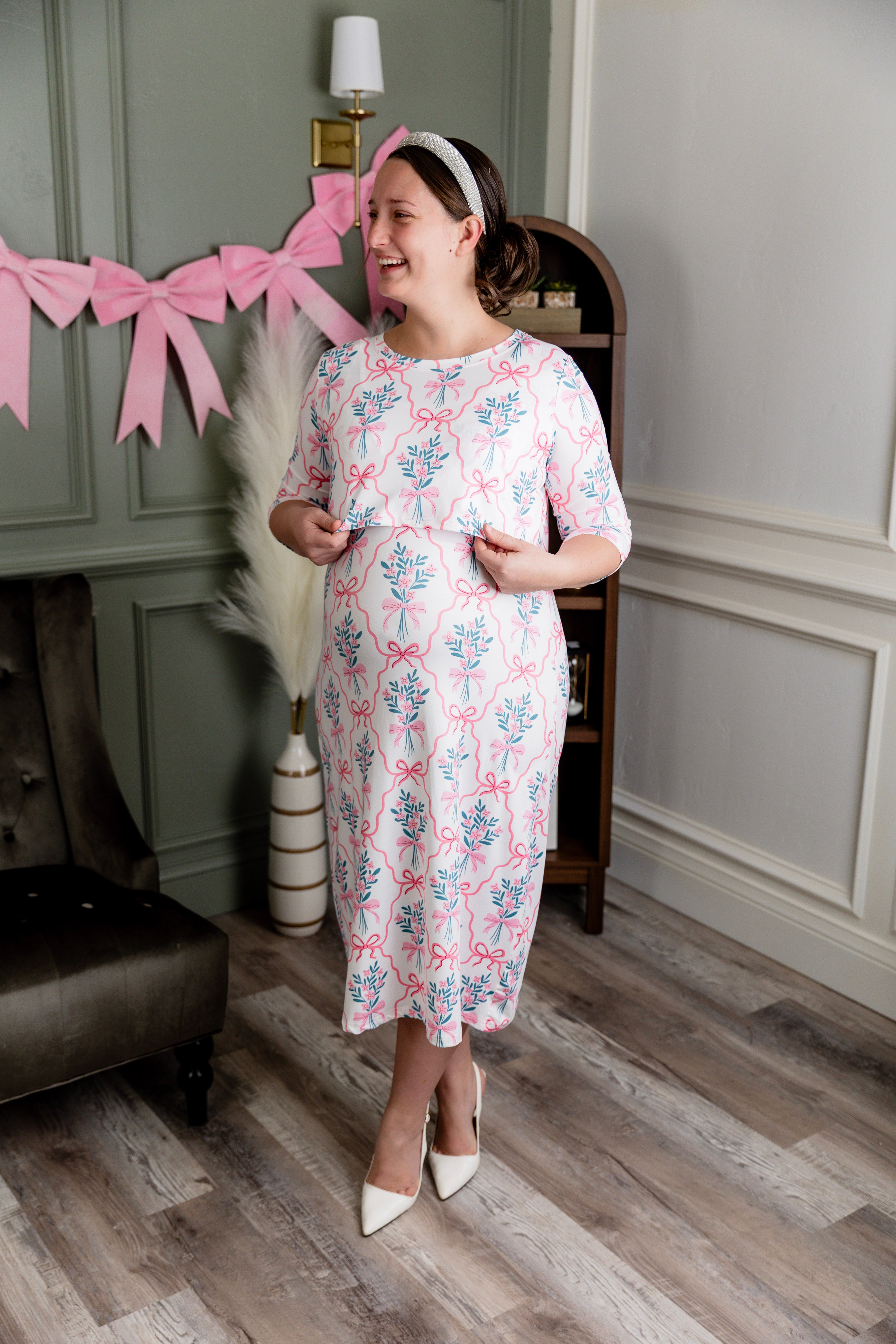 Model wearing Nuggles® Nalani Nursing Dress in Pixie Petals