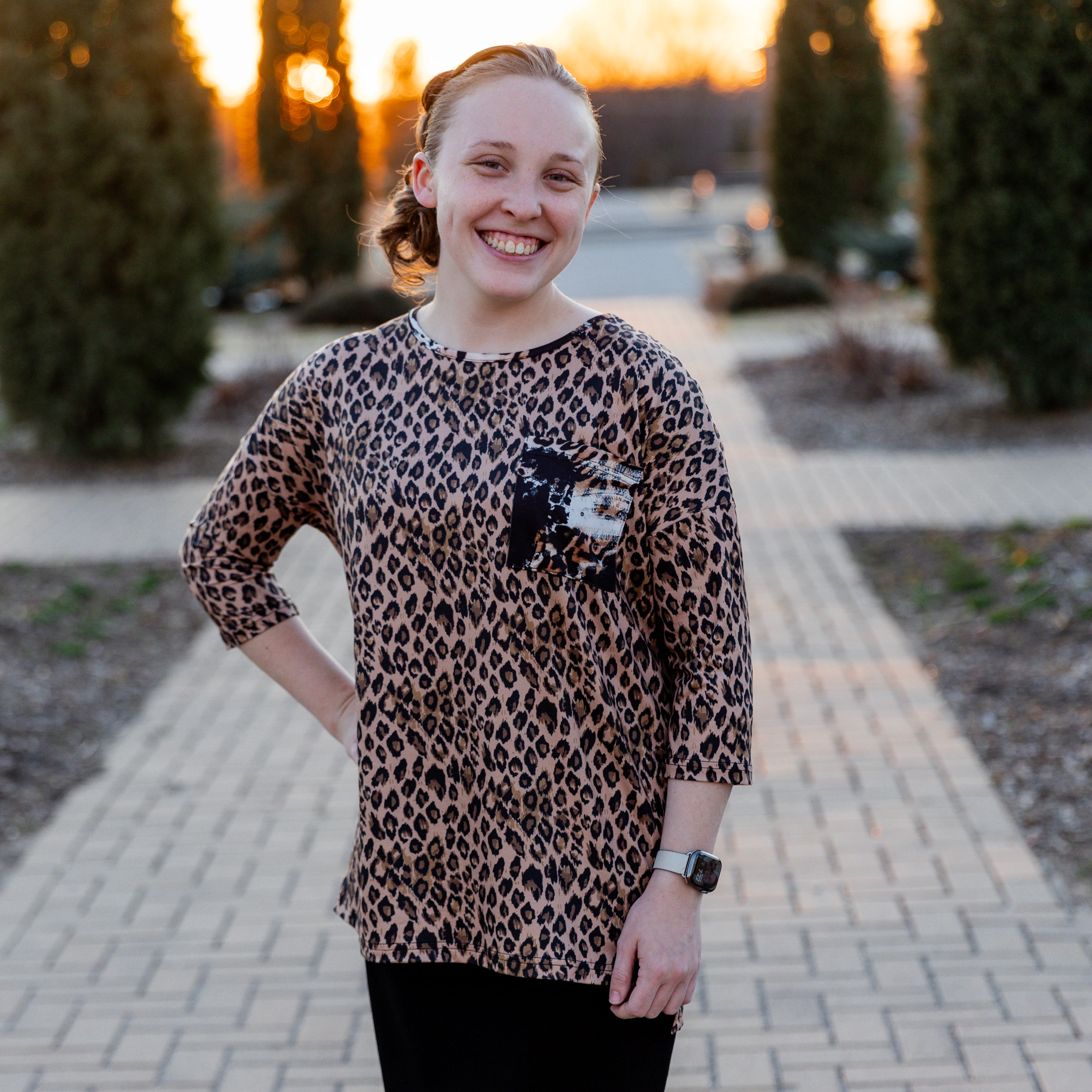 Modest women's Paisley Top with 3/4 sleeves, front pocket, and contrast knit fabrics, styled with a classic skirt – perfect for everyday wear or church outfits