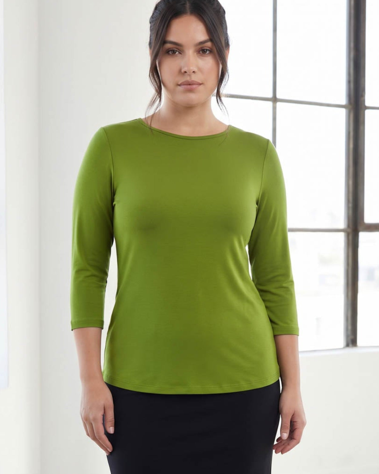 Model wearing Nuggles® 3/4 Essential Tee in Avocado