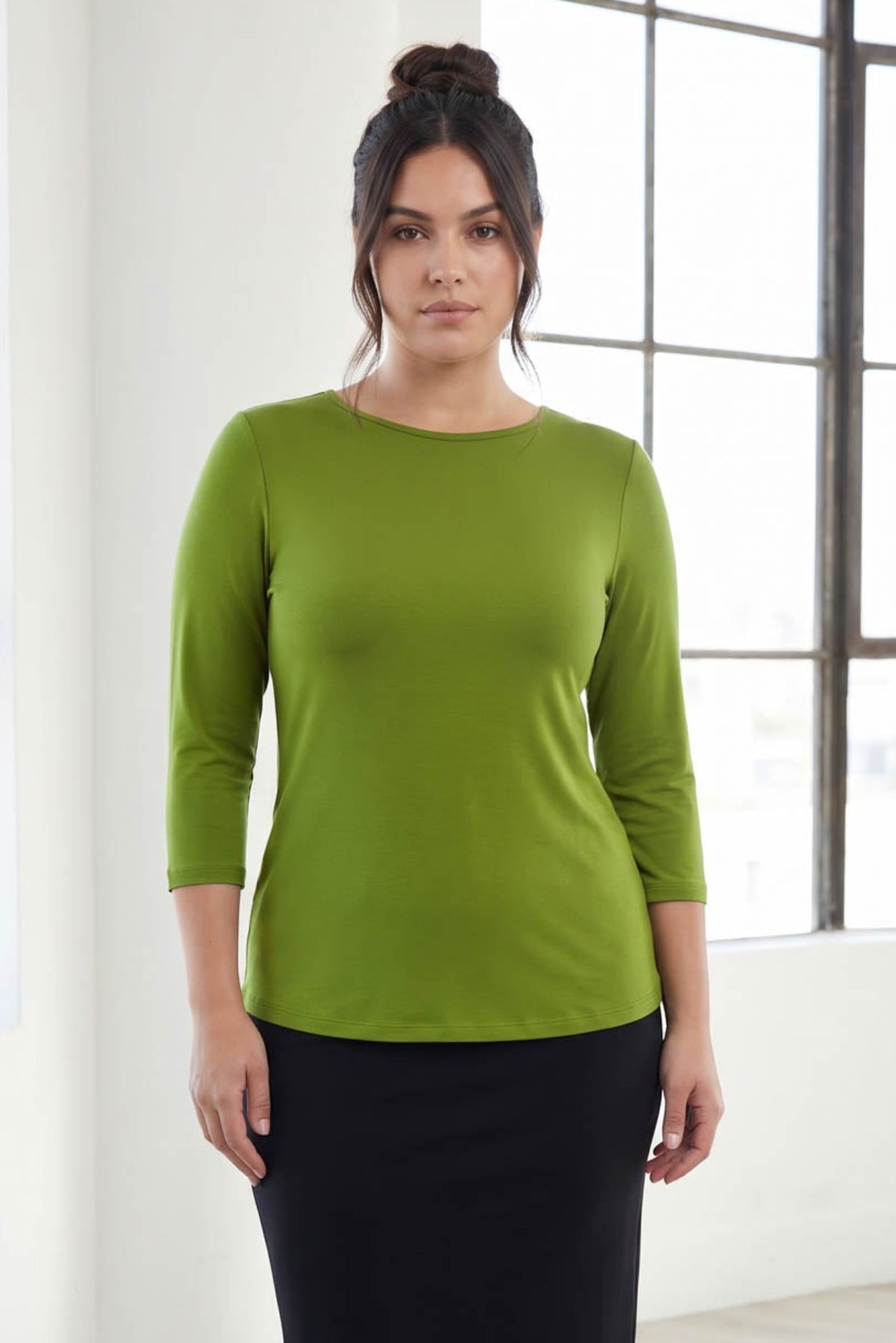 Model wearing Nuggles® 3/4 Essential Tee in Avocado