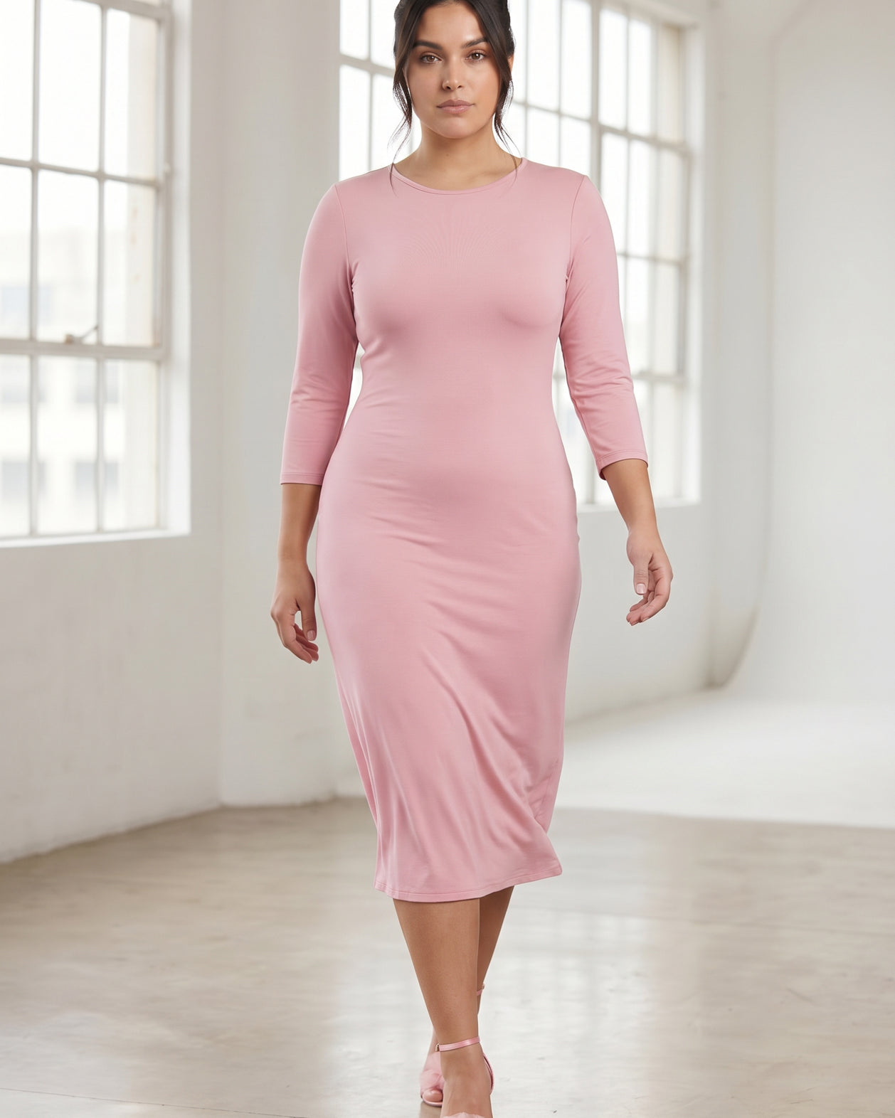 Model wearing Nuggles® Midi Layering Dress in Baby Pink