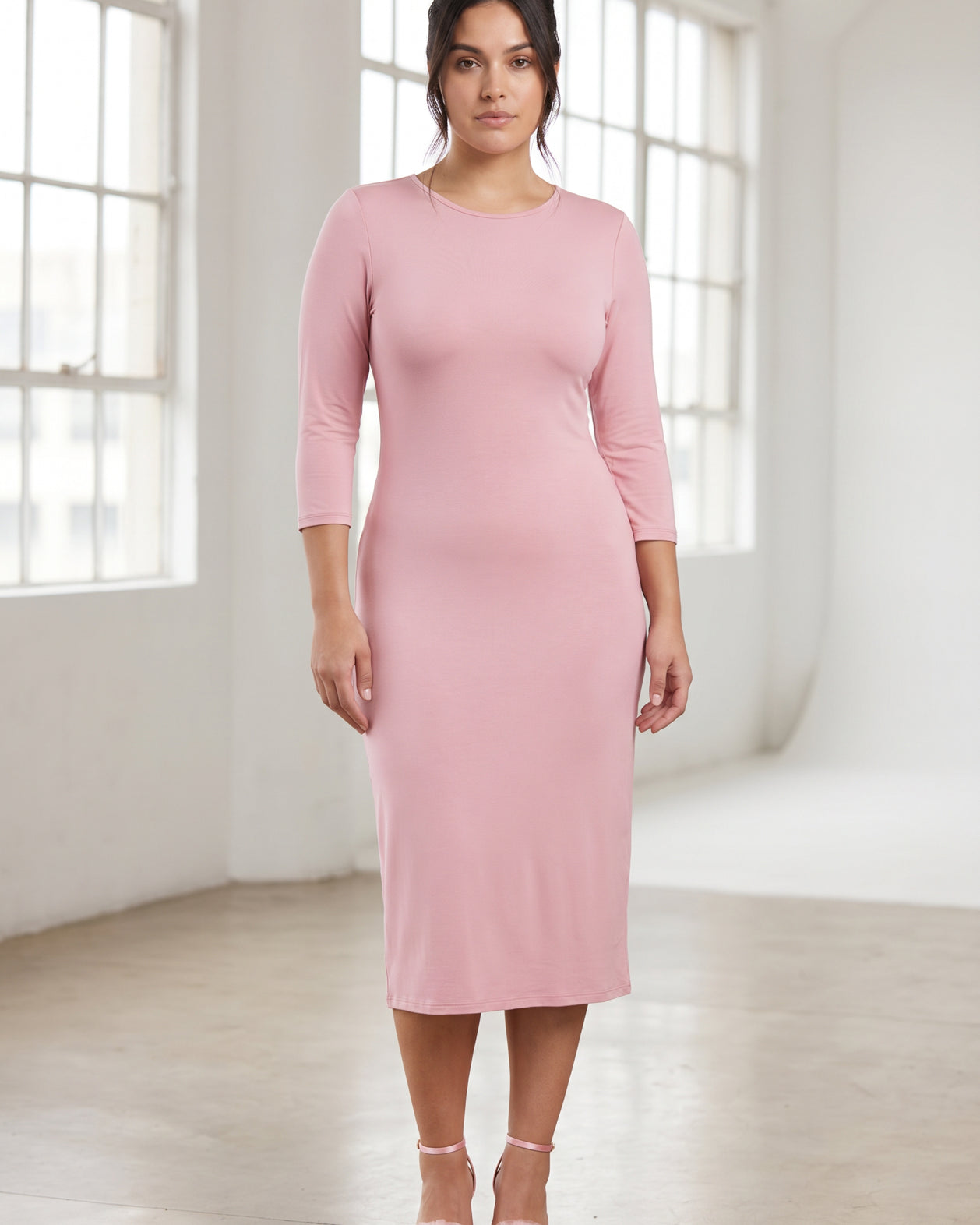 Model wearing Nuggles® Midi Layering Dress in Baby Pink