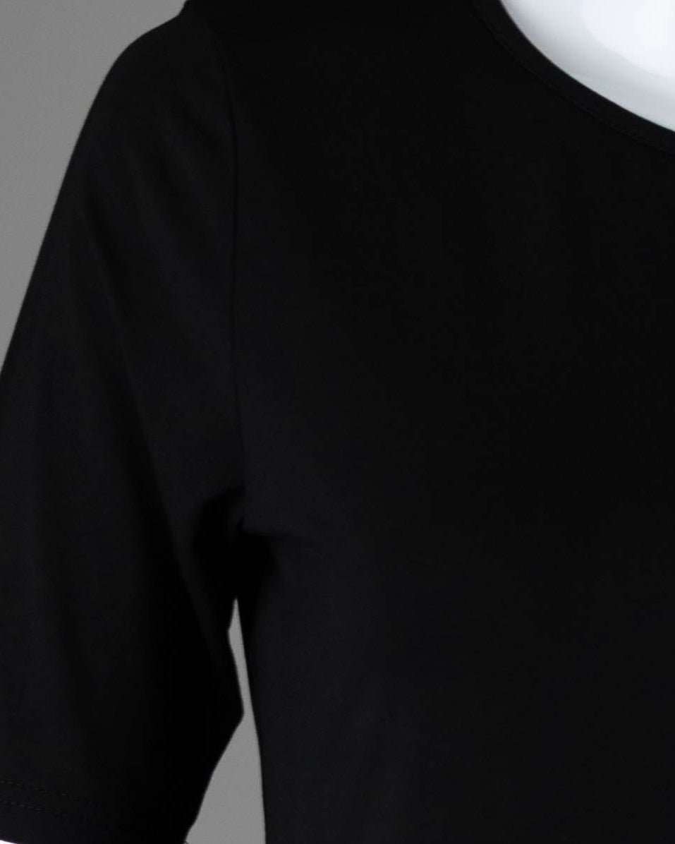 Model wearing Nuggles® Half Sleeve Essential Tee in Black