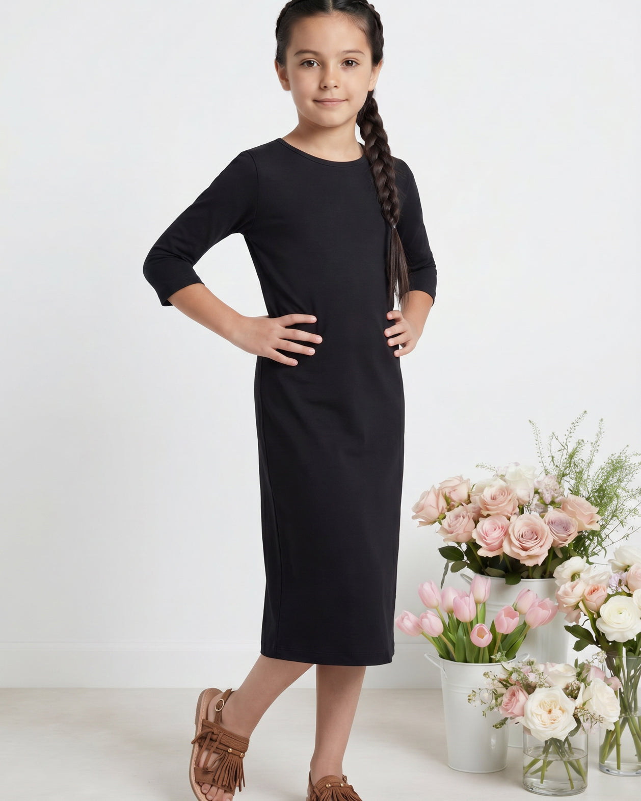 Model wearing Nuggles® Girls Midi Layering Dress in Black