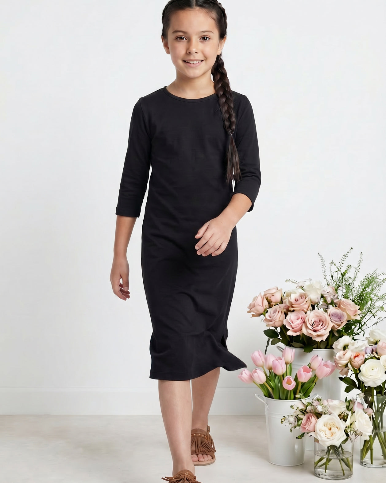 Model wearing Nuggles® Girls Midi Layering Dress in Black
