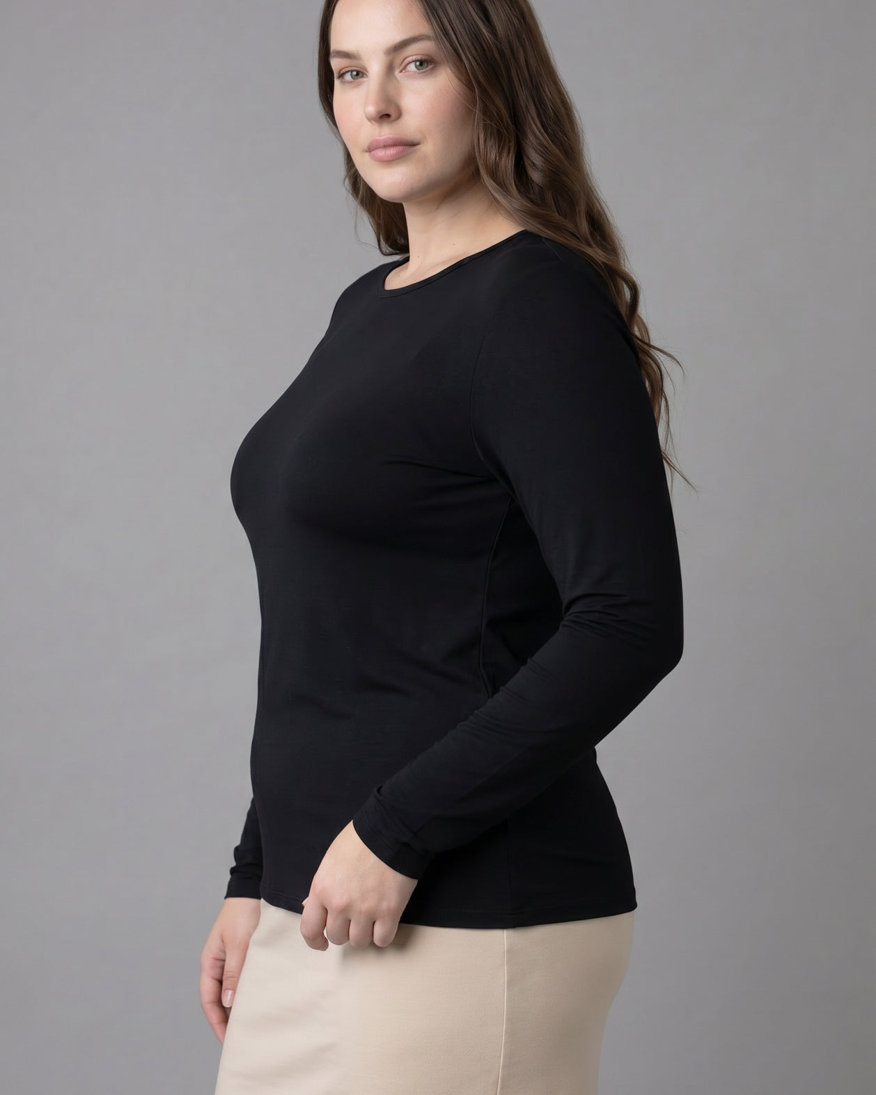 Model wearing Nuggles® Long Sleeve Essential Tee in Black