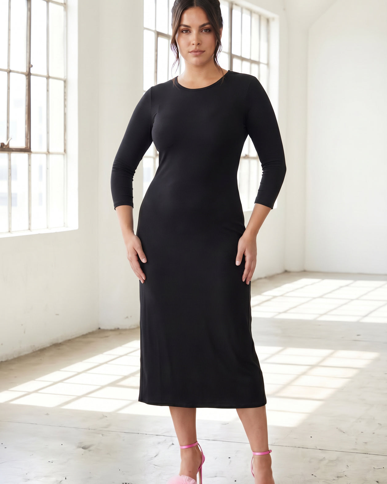 Model wearing Nuggles® Ribbed Midi Layering Dress in Black