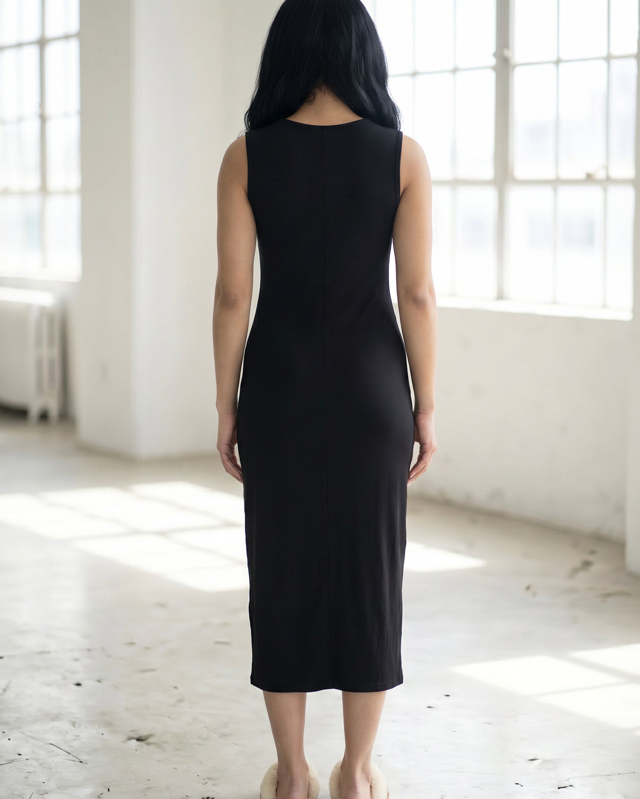 Model wearing Nuggles® Tank Midi Dress in Black