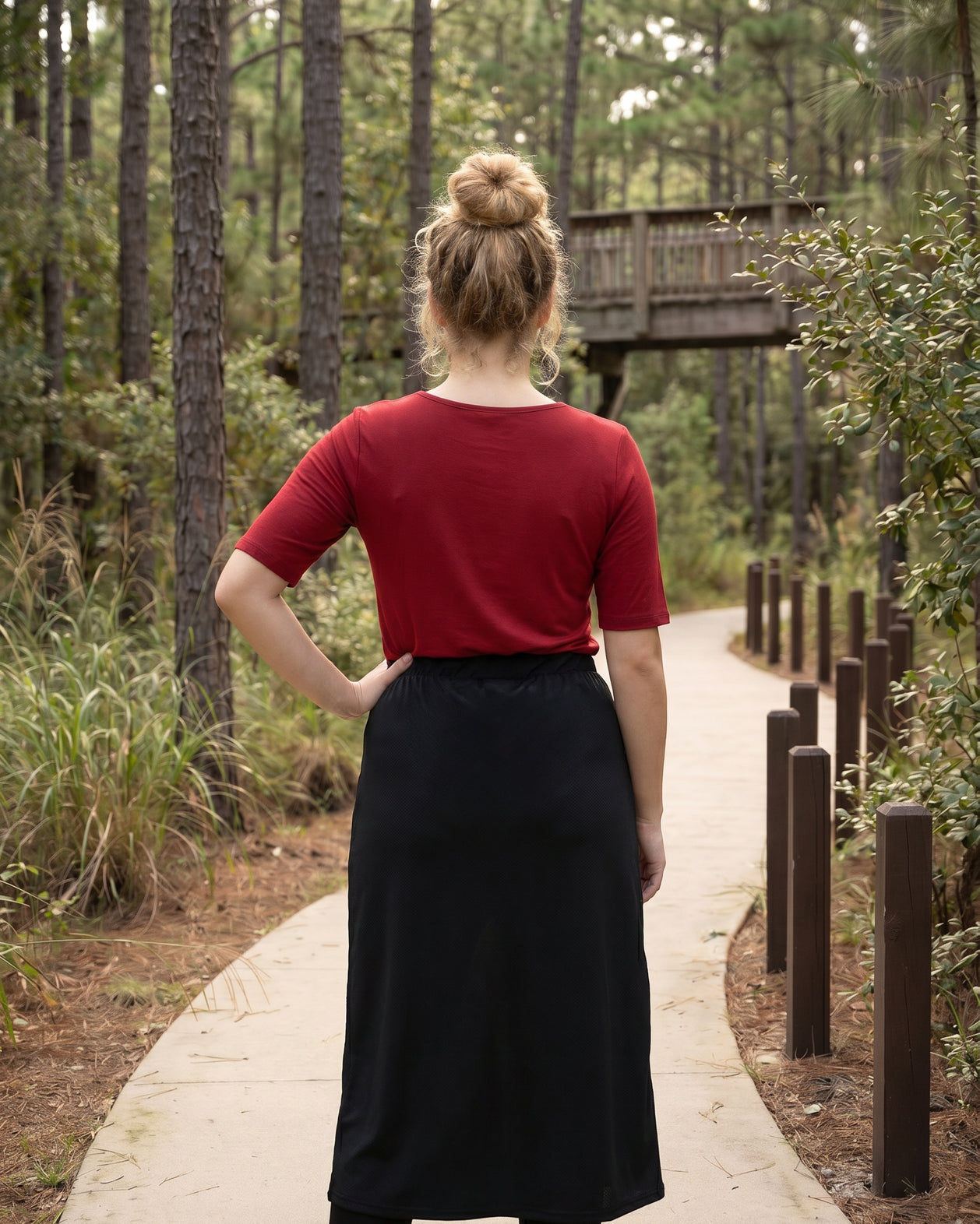 Model wearing Nuggles® 31" All-Sport Skirt in Black