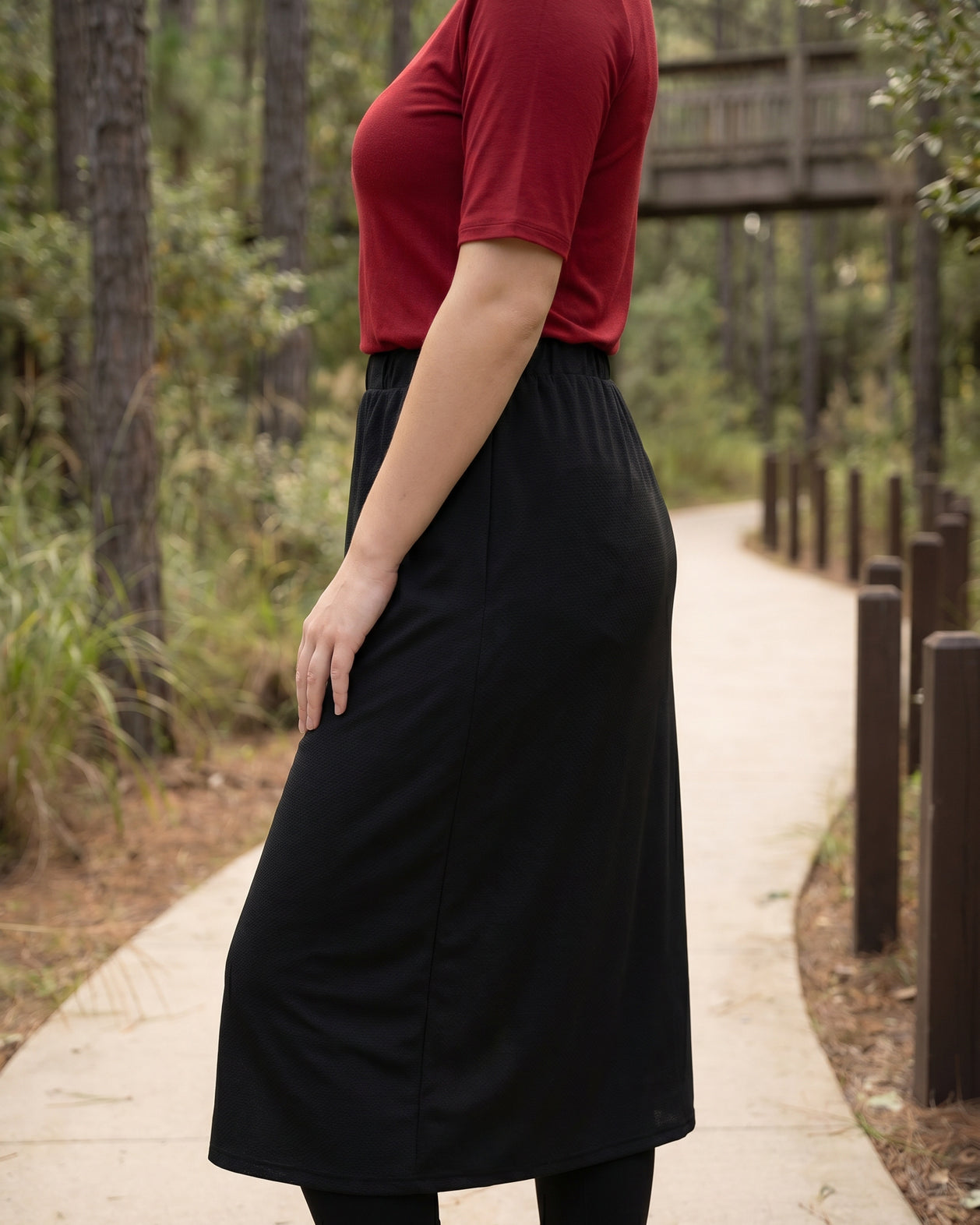 Model wearing Nuggles® 31" All-Sport Skirt in Black