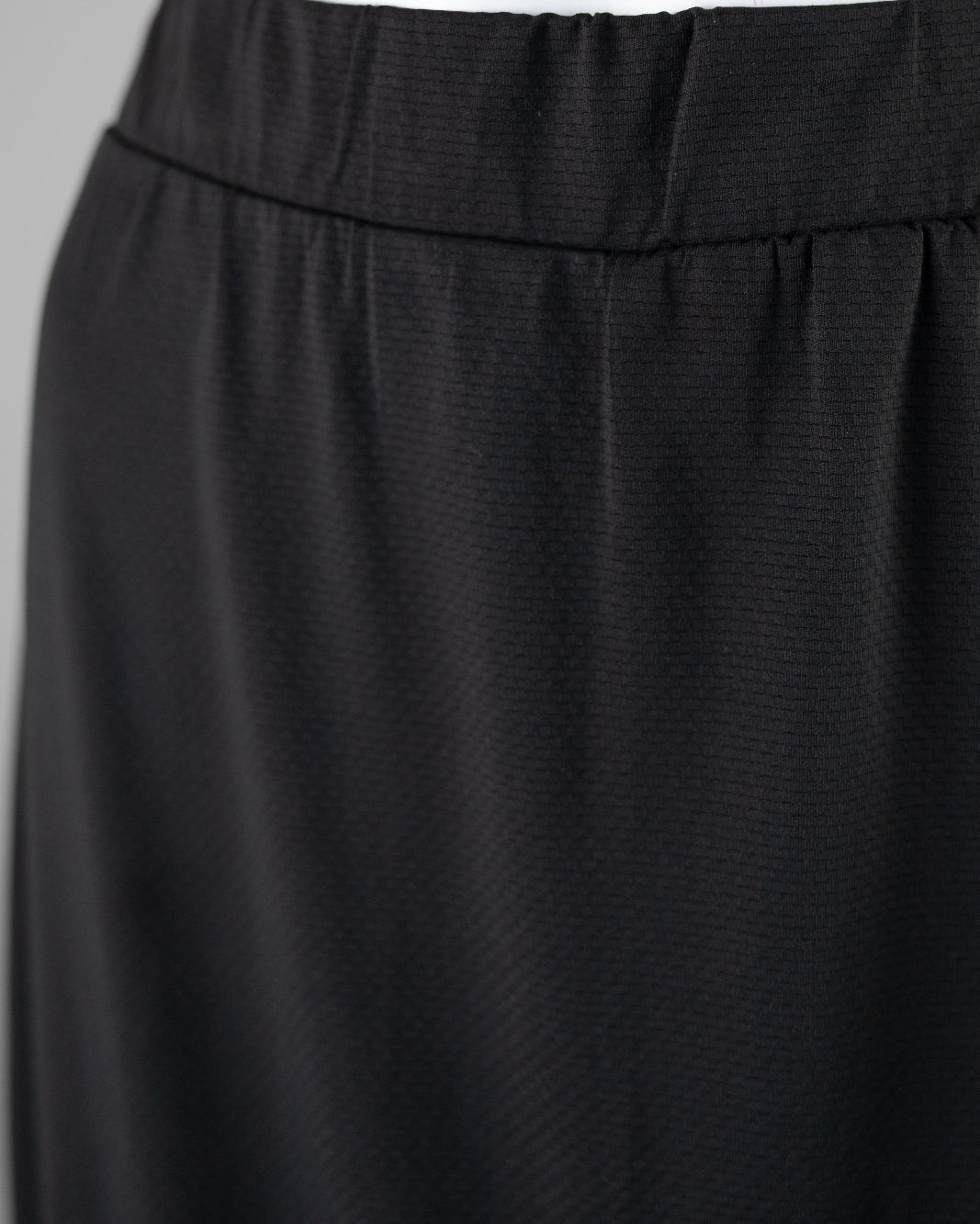 Model wearing Nuggles® 31" All-Sport Skirt in Black