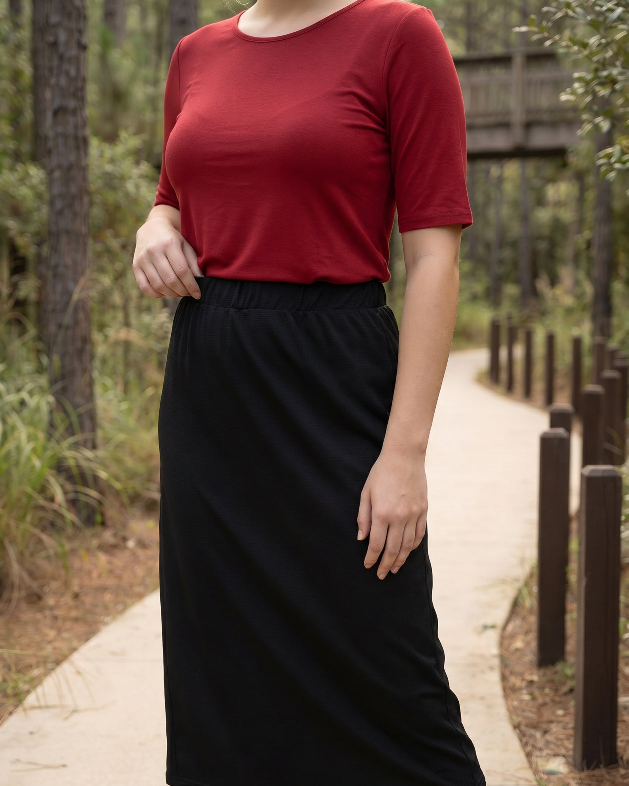Model wearing Nuggles® 31" All-Sport Skirt in Black
