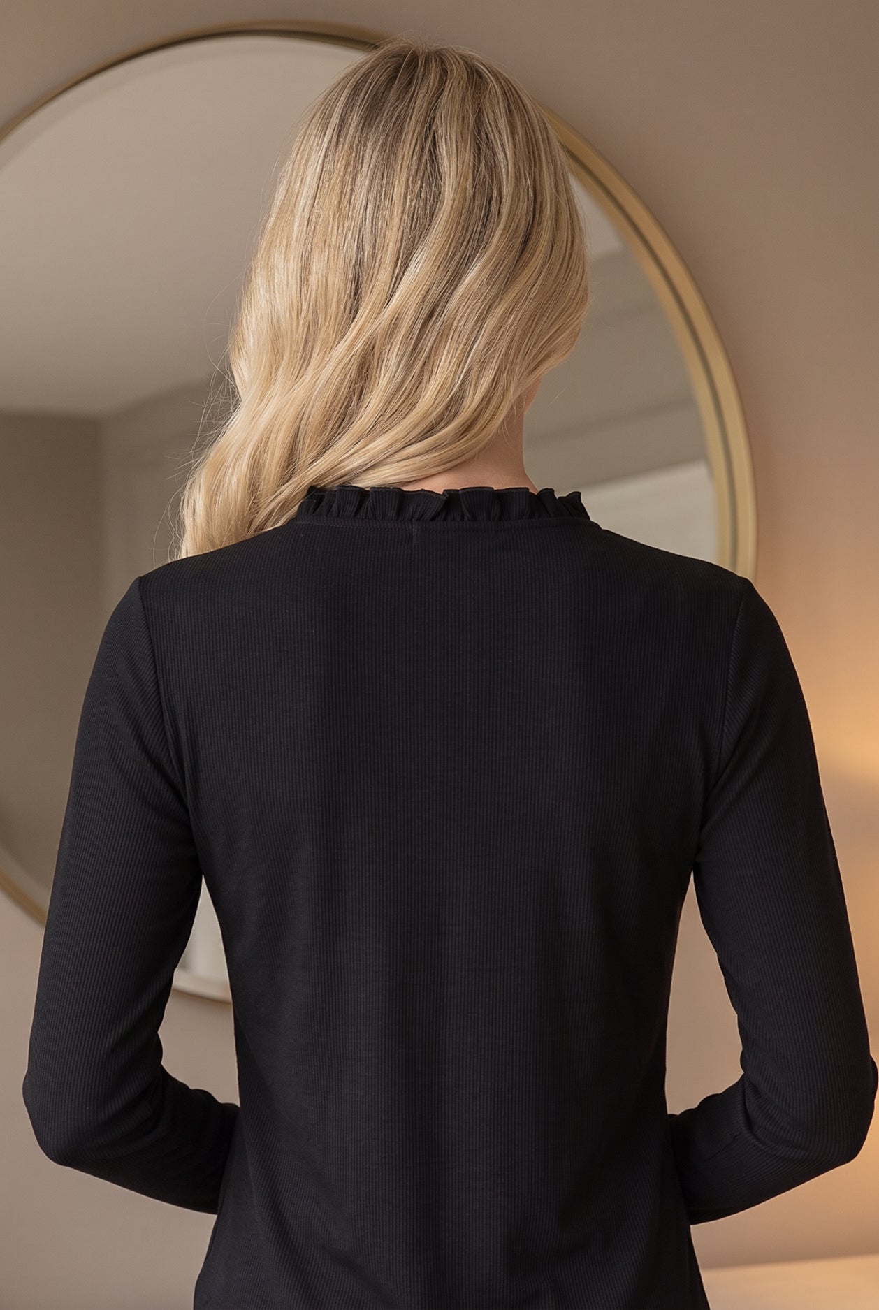 Model wearing Nuggles® Bethany Shirt & Skirt in Black