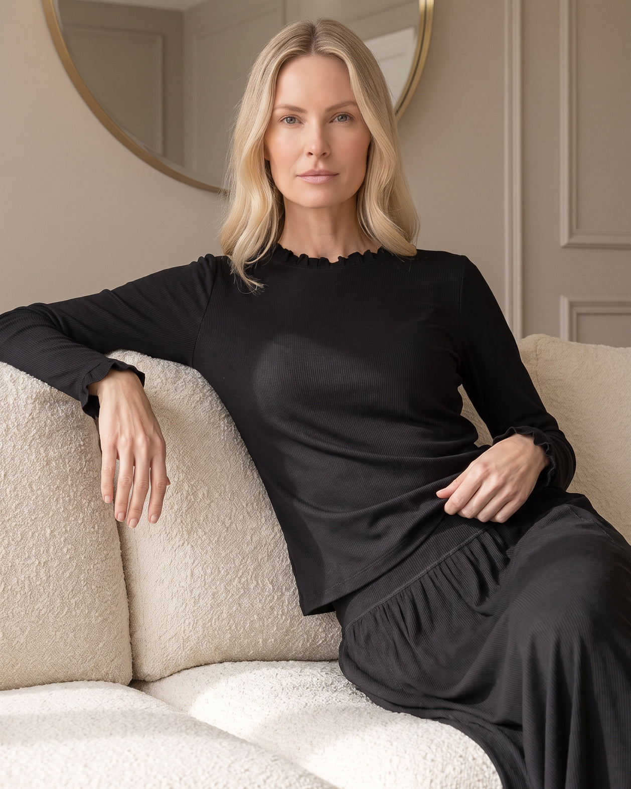 Model wearing Nuggles® Bethany Shirt & Skirt in Black