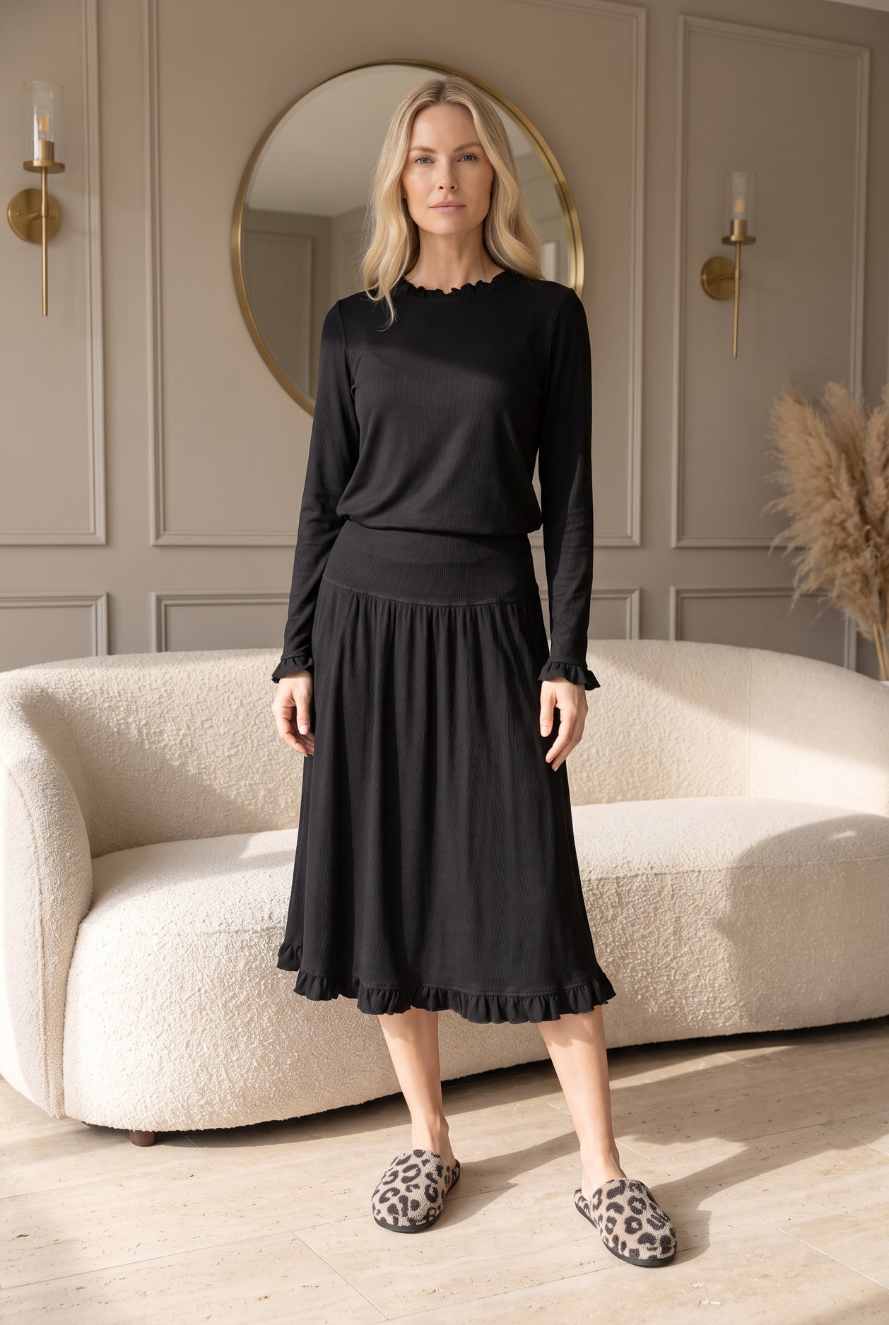 Model wearing Nuggles® Bethany Shirt & Skirt in Black