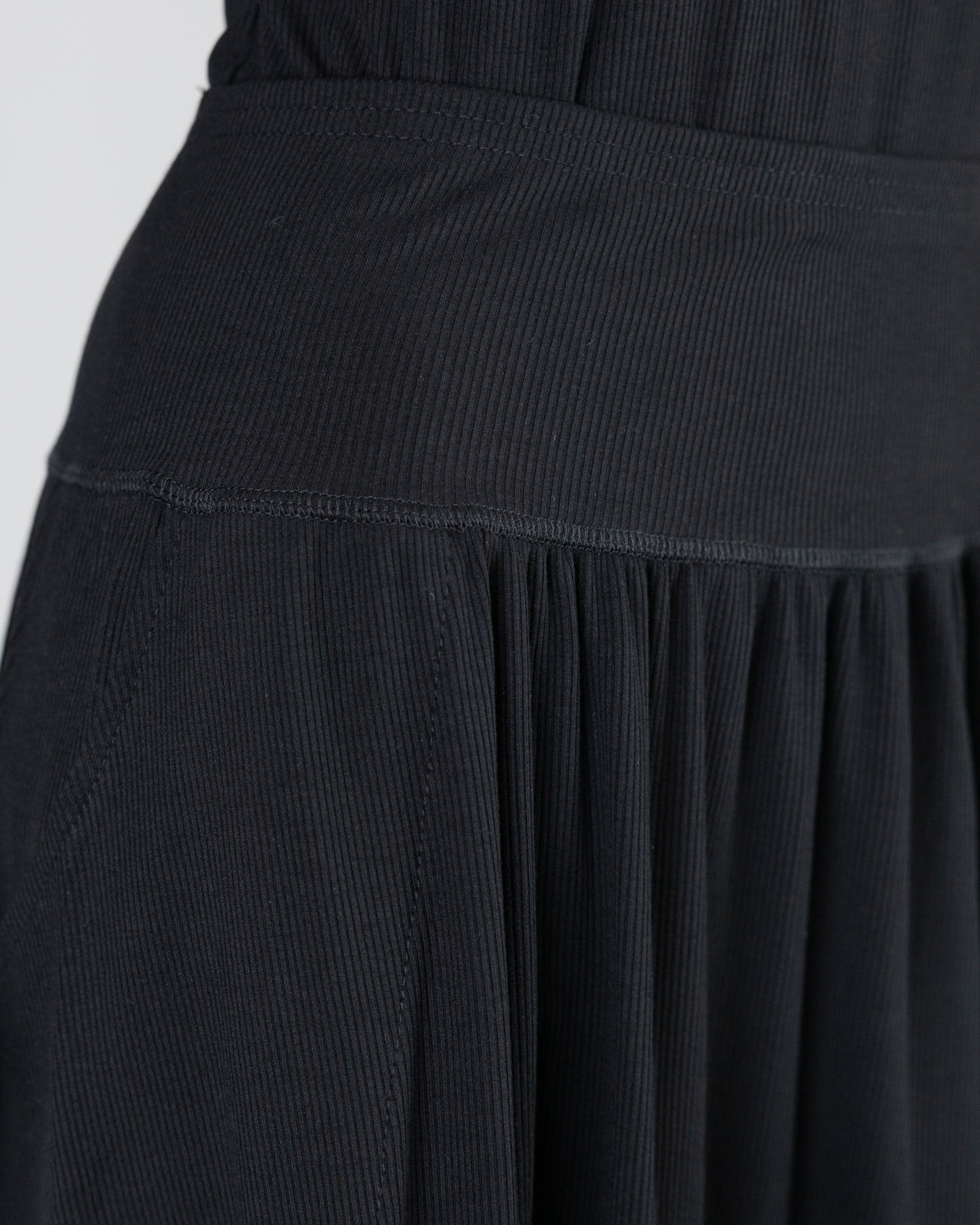 Model wearing Nuggles® Bethany Shirt & Skirt in Black