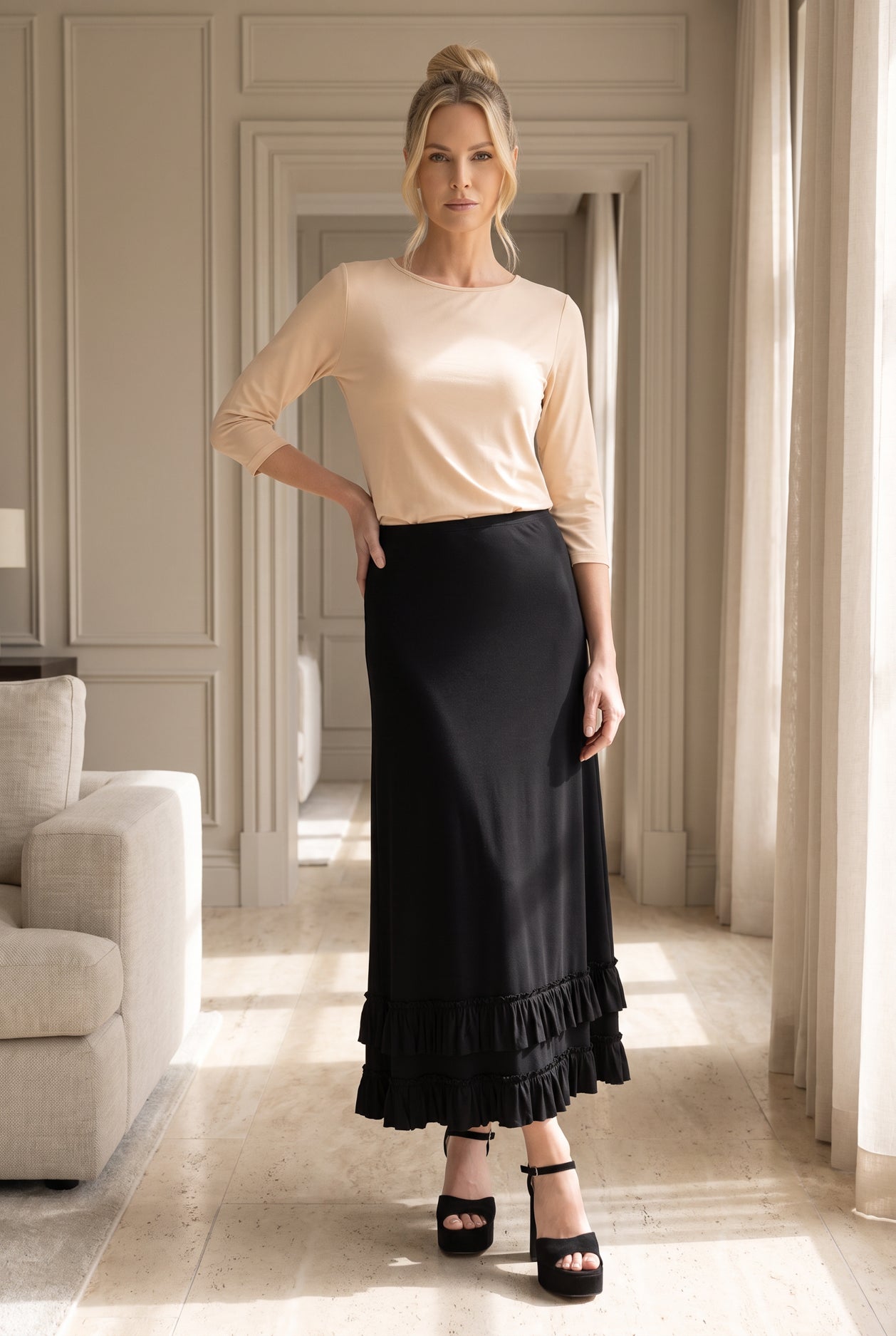 Model wearing Nuggles® Callie Skirt in Black