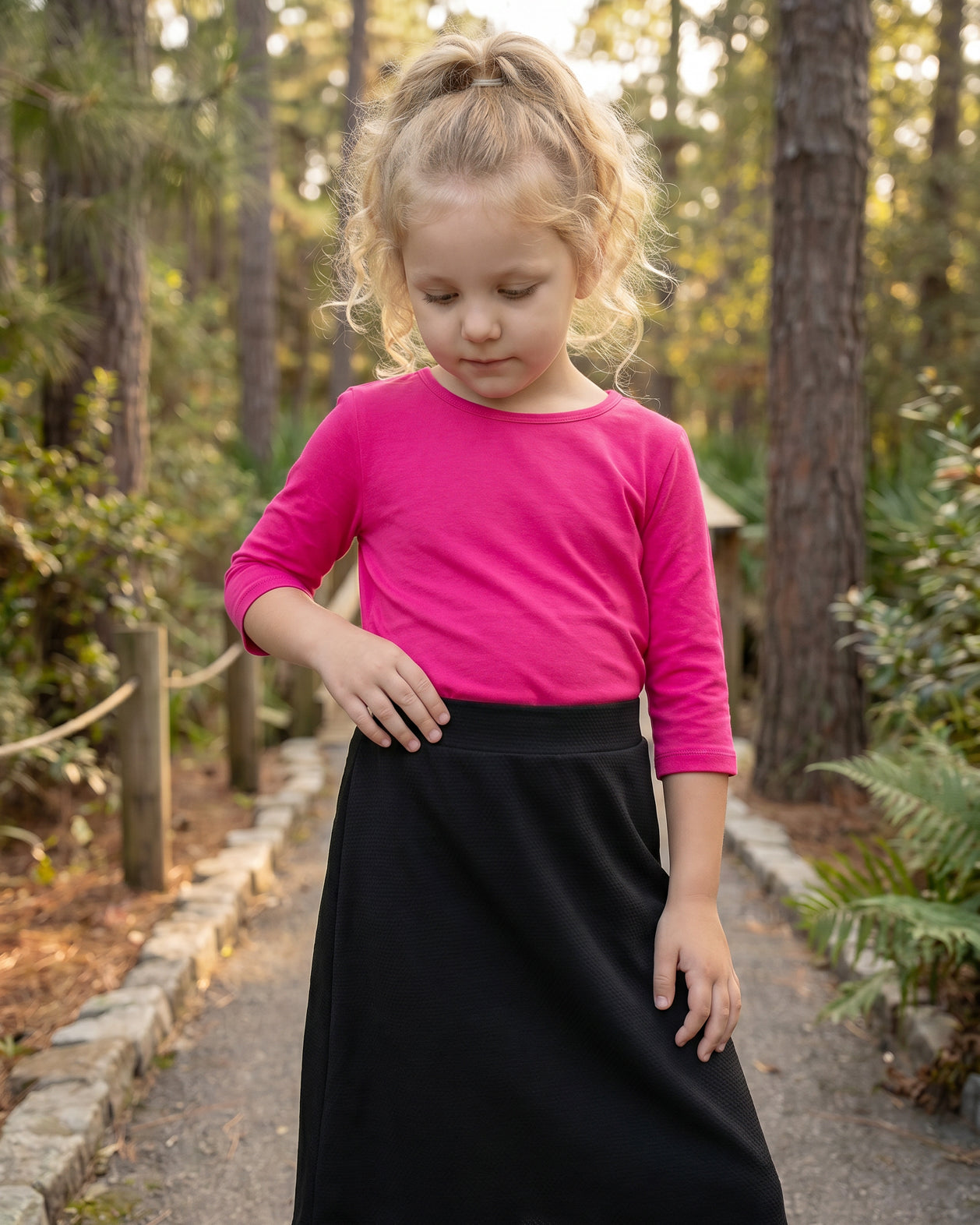 Model wearing Nuggles® Girls All-Sport Skirt in Black