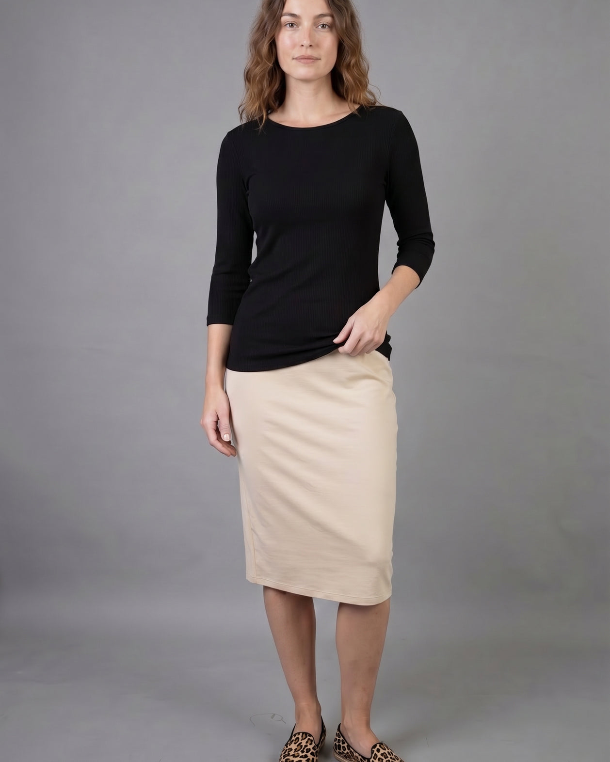 Model wearing Nuggles® 3/4 Essential Ribbed Tee in Black
