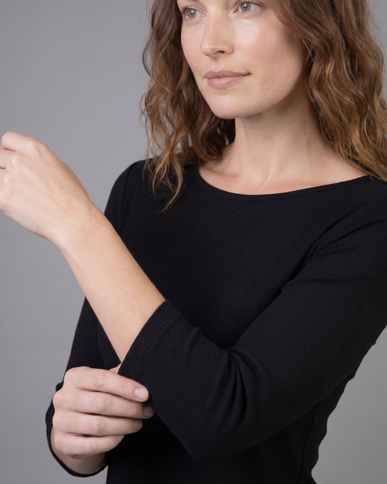 Model wearing Nuggles® 3/4 Essential Ribbed Tee in Black