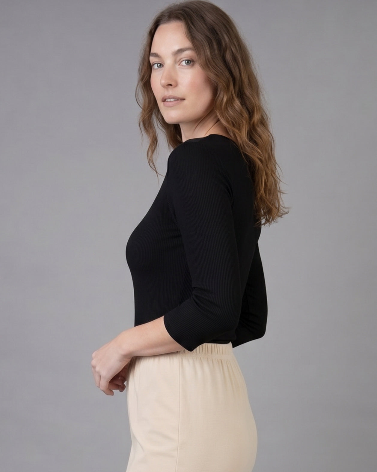 Model wearing Nuggles® 3/4 Essential Ribbed Tee in Black