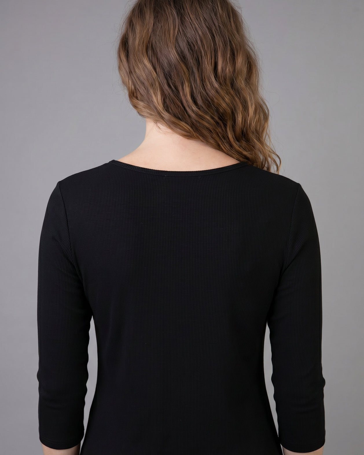 Model wearing Nuggles® 3/4 Essential Ribbed Tee in Black