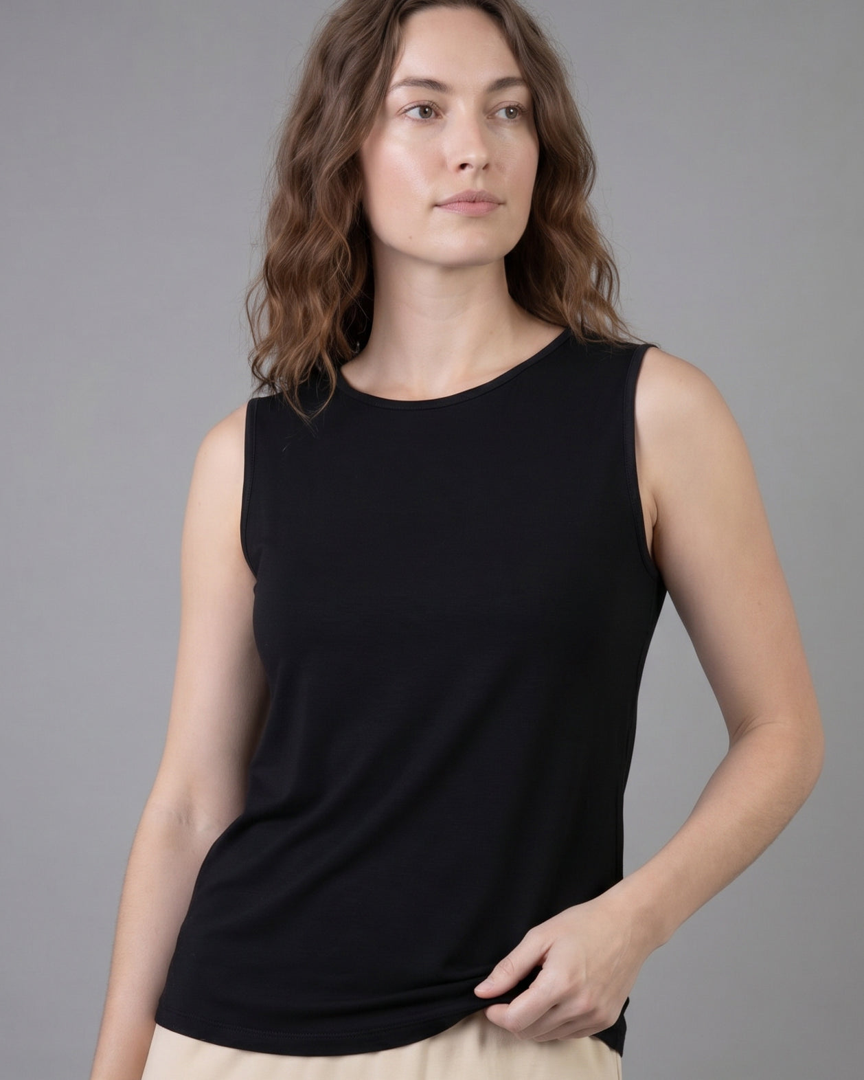 Model wearing Nuggles® Essential Tank in Black