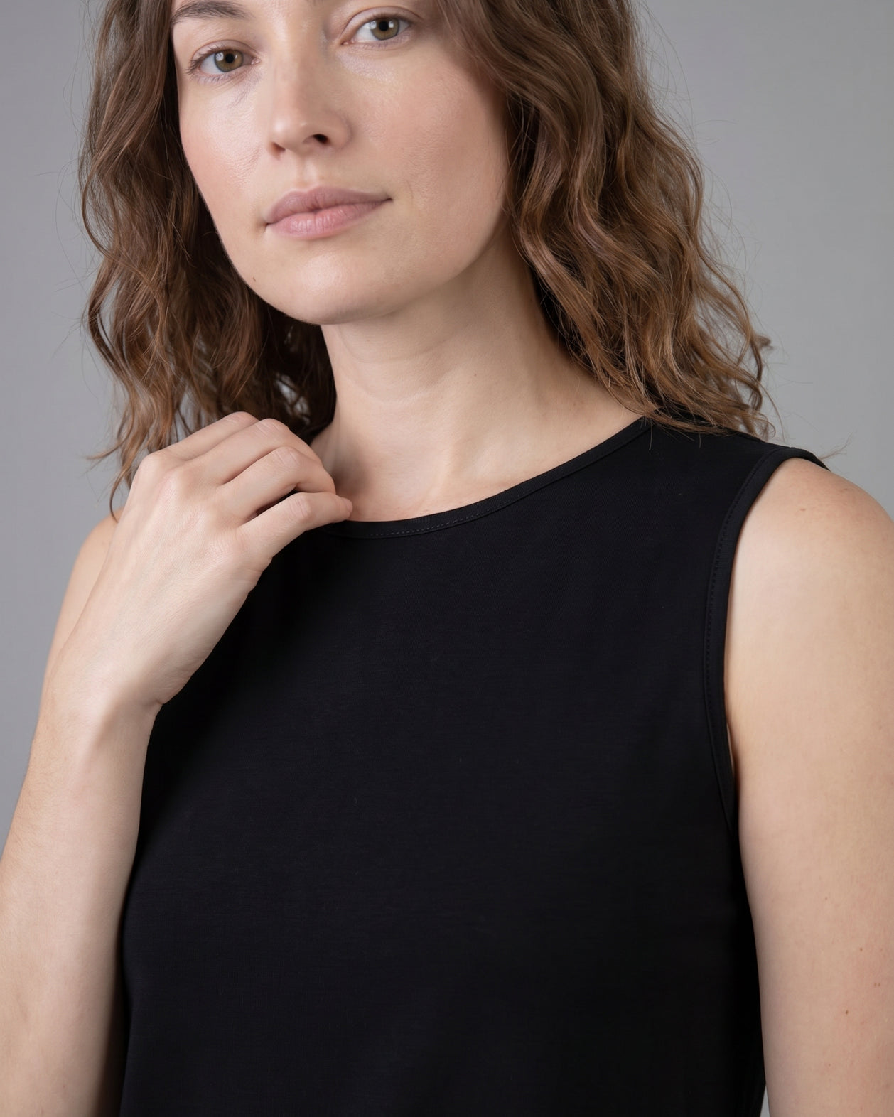 Model wearing Nuggles® Essential Tank in Black