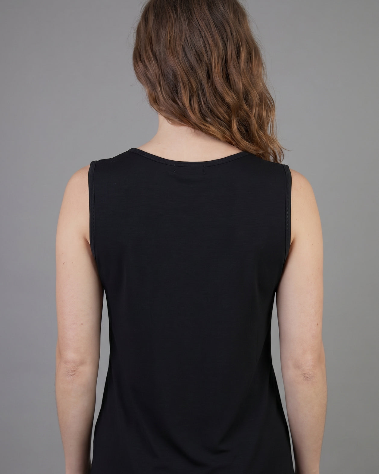 Model wearing Nuggles® Essential Tank in Black