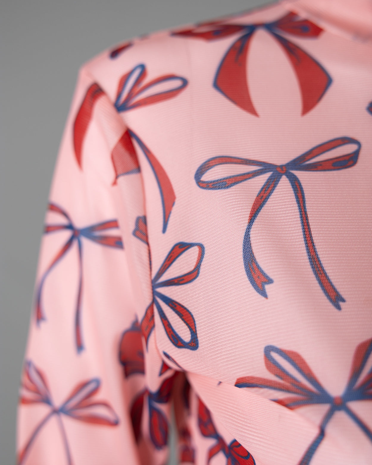 A close up of the mesh tee.