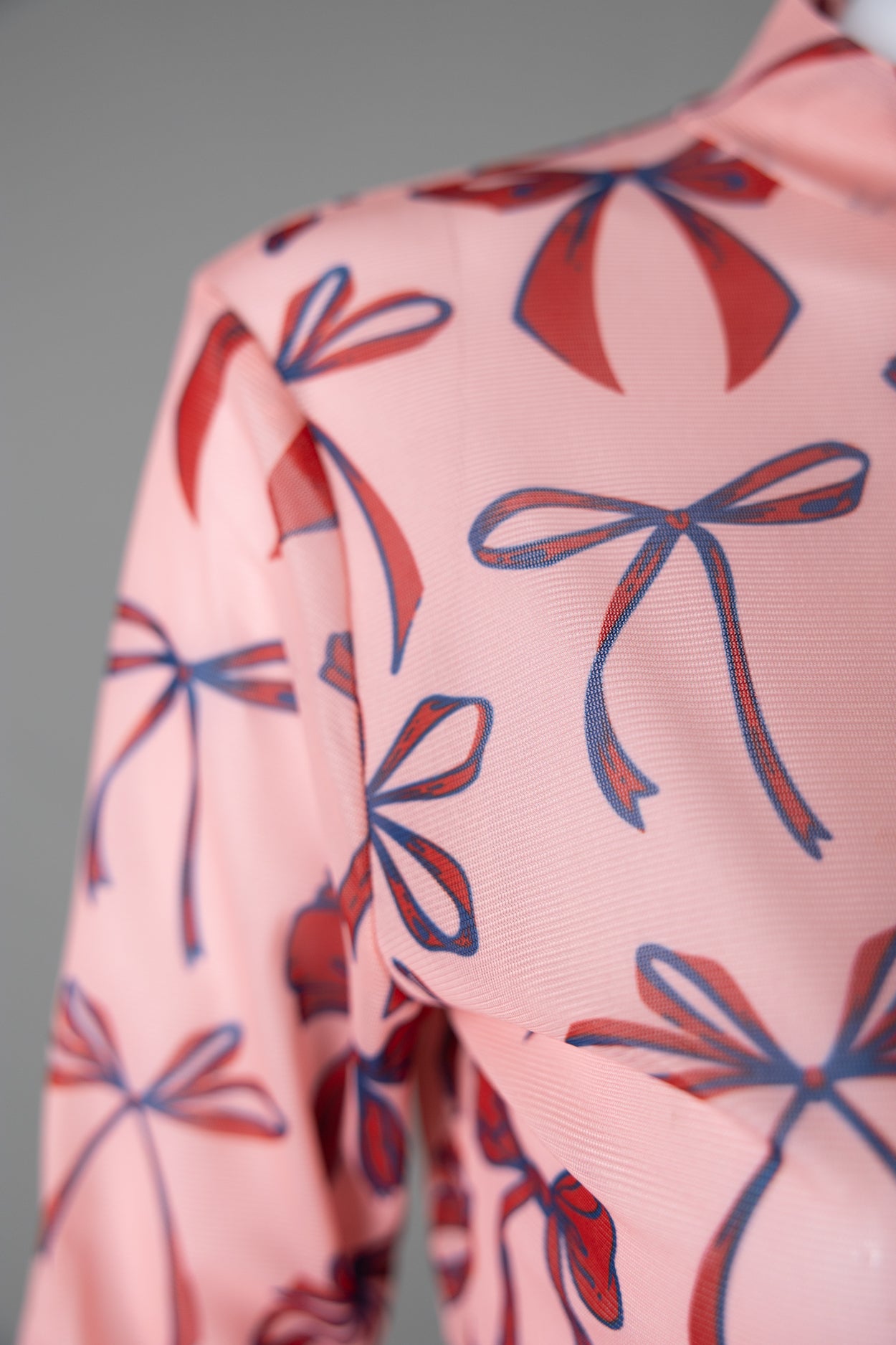 A close up of the mesh tee.