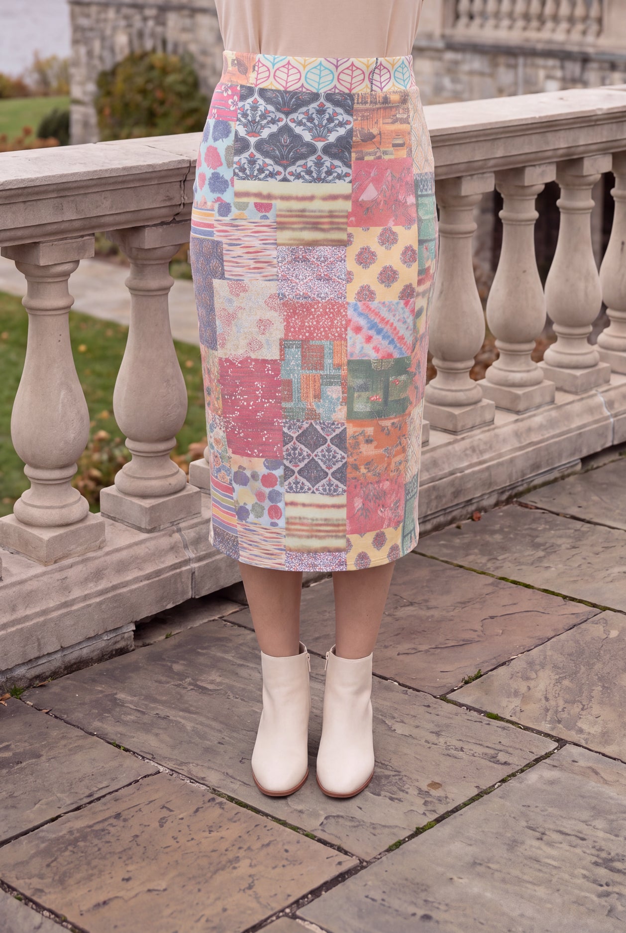 Model wearing Nuggles® Iris Sweater Skirt in Boho Mosaic