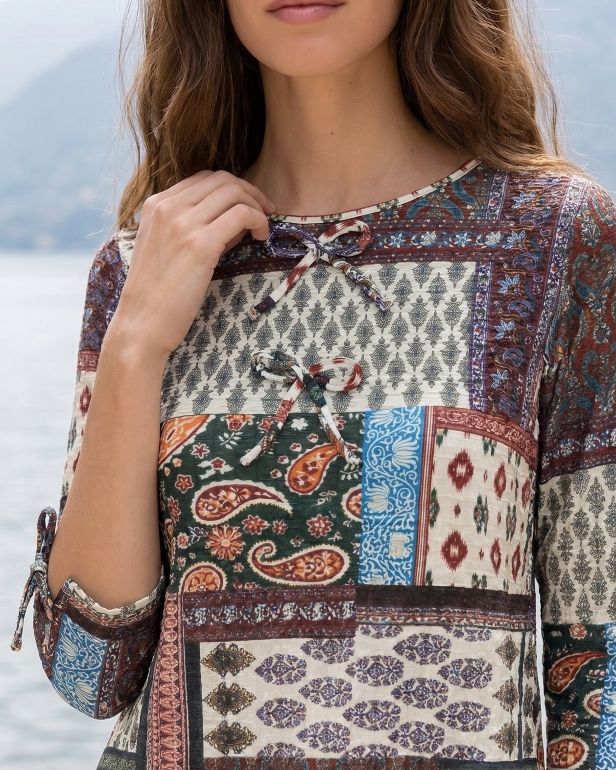 Model wearing Nuggles® Lexi Bow Top in Boho Patchwork