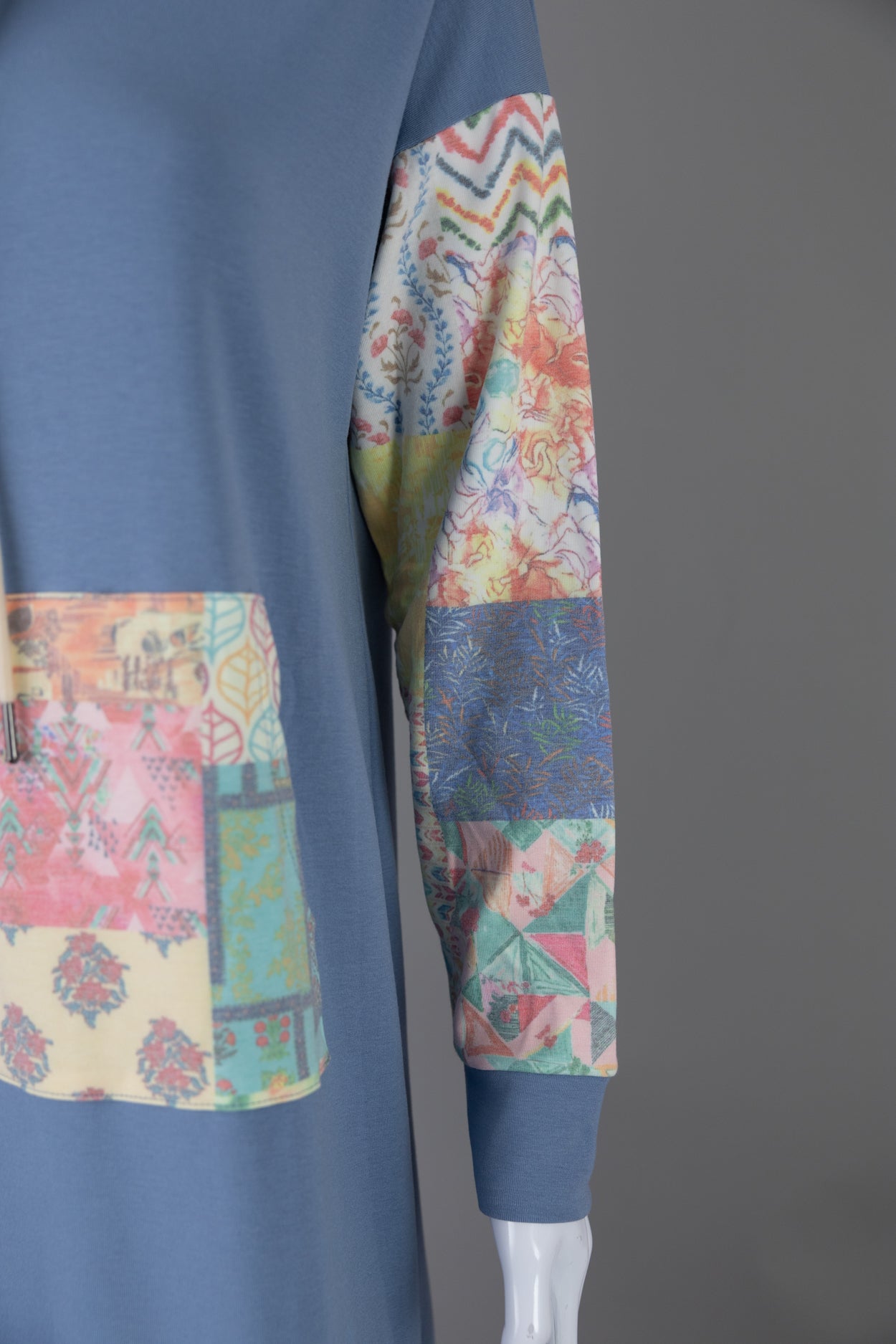 Model wearing Nuggles® Hoodie Dress in Boho Mosaic