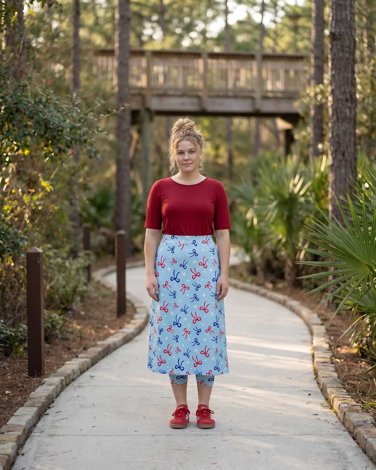 Model wearing Nuggles® 31" All-Sport Skirt in Bow Active