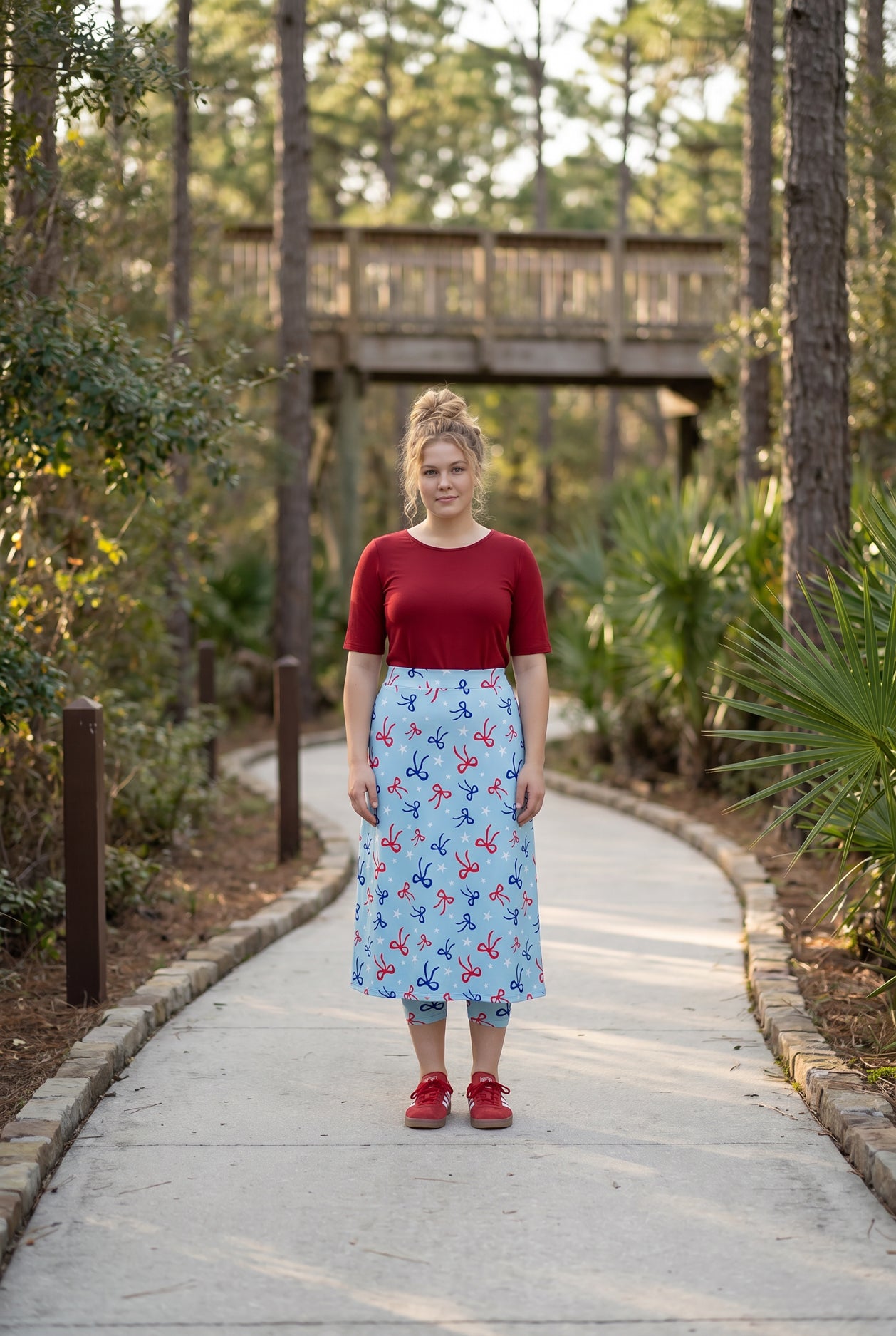 Model wearing Nuggles® 31" All-Sport Skirt in Bow Active