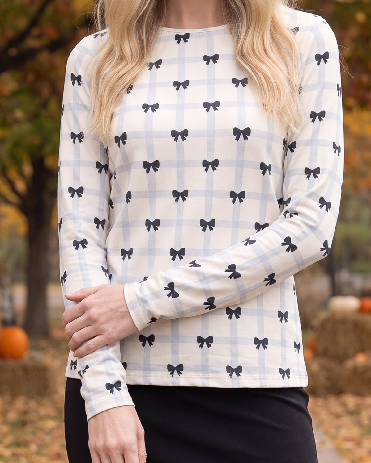 Model wearing Nuggles® Long Sleeve Essential Tee in Bow Check