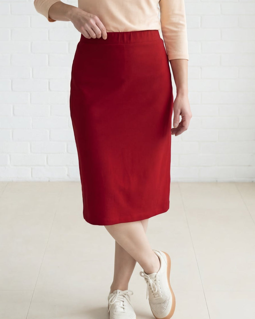 Model wearing Nuggles® 27" Relaxed Midi Skirt in Brick Red