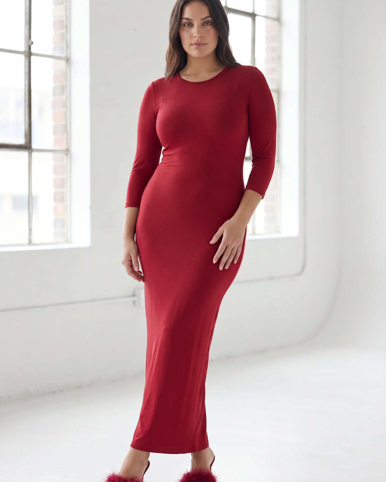 Model wearing Nuggles® Maxi Layering Dress in Brick Red