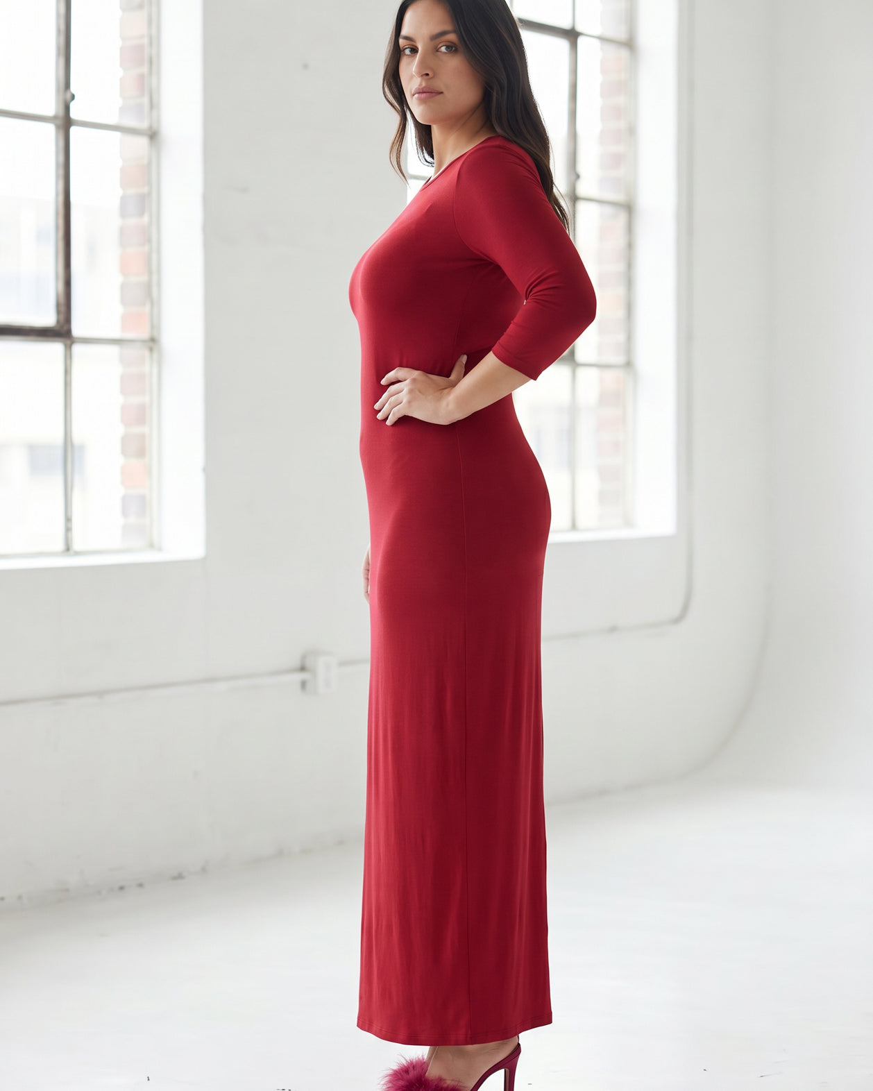 Model wearing Nuggles® Maxi Layering Dress in Brick Red
