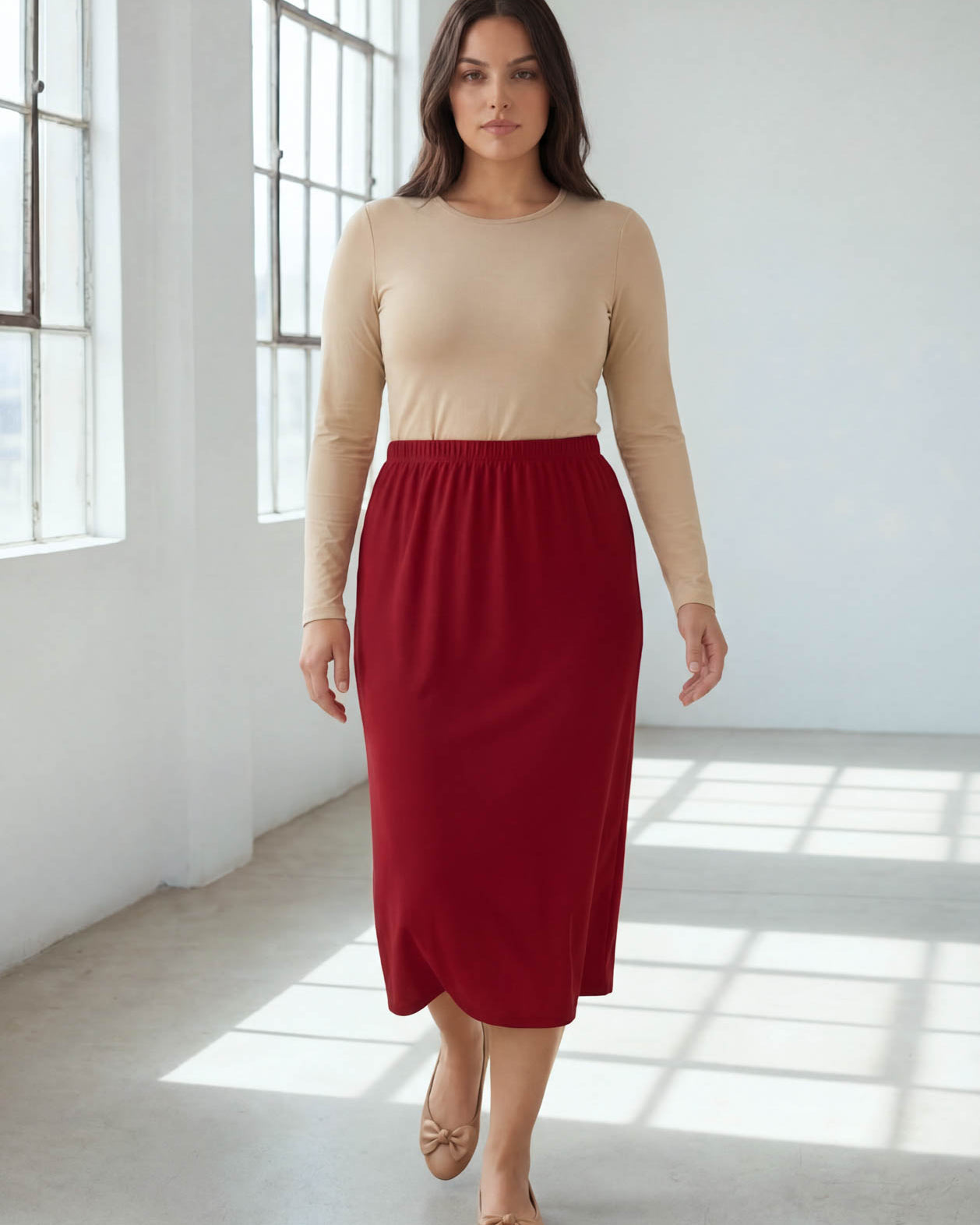 Model wearing Nuggles® 31" Classic Skirt in Brick Red
