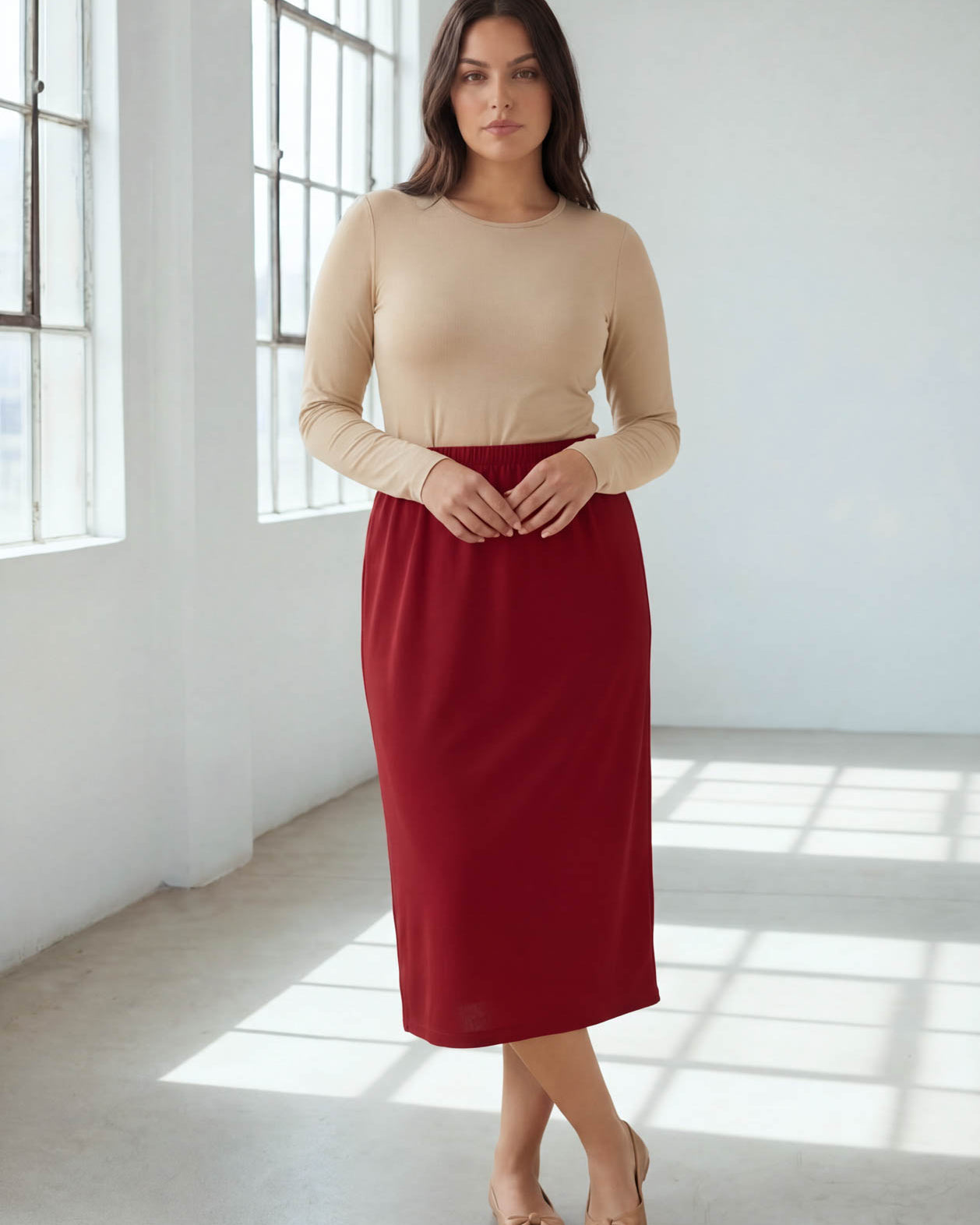 Model wearing Nuggles® 31" Classic Skirt in Brick Red