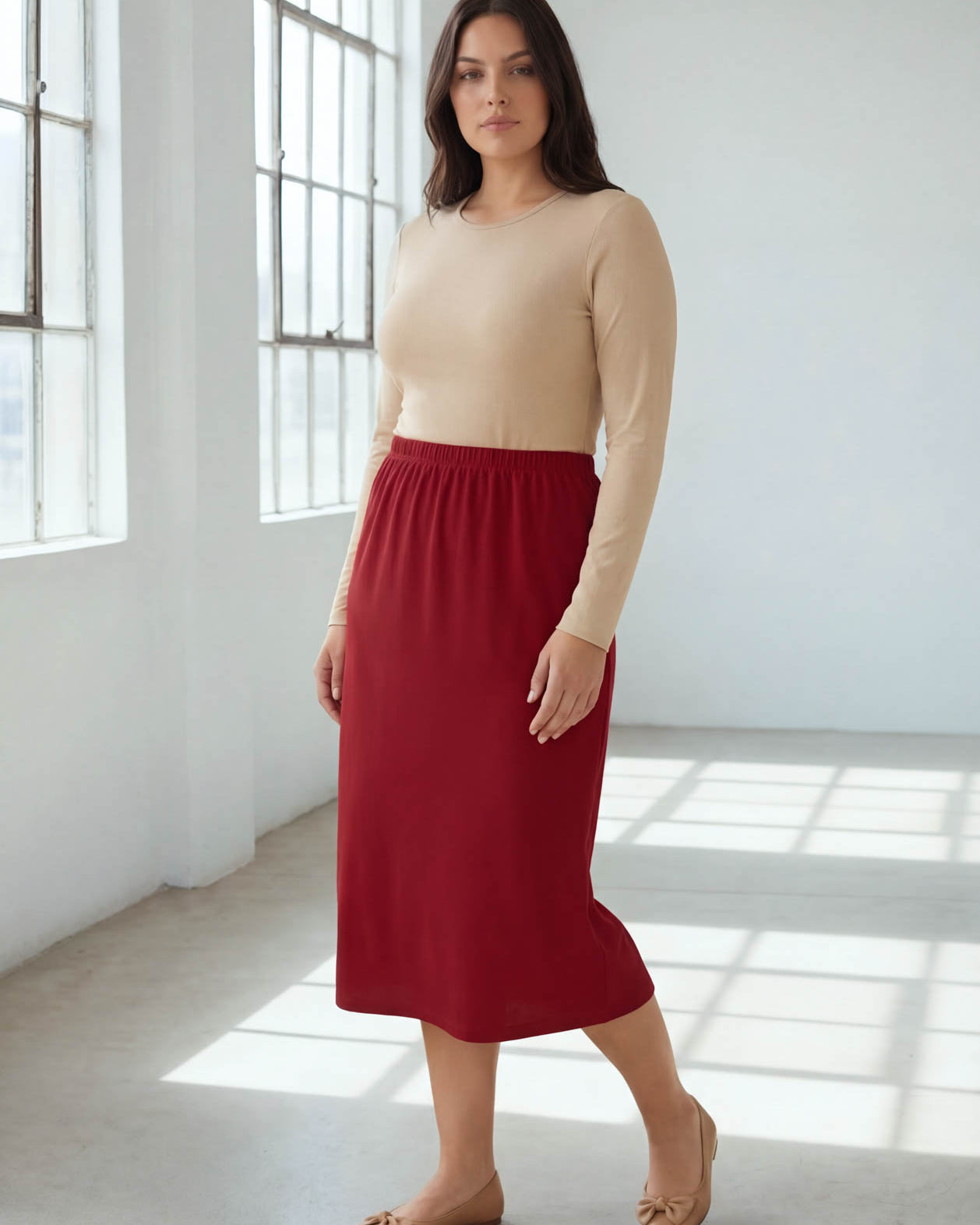 Model wearing Nuggles® 31" Classic Skirt in Brick Red