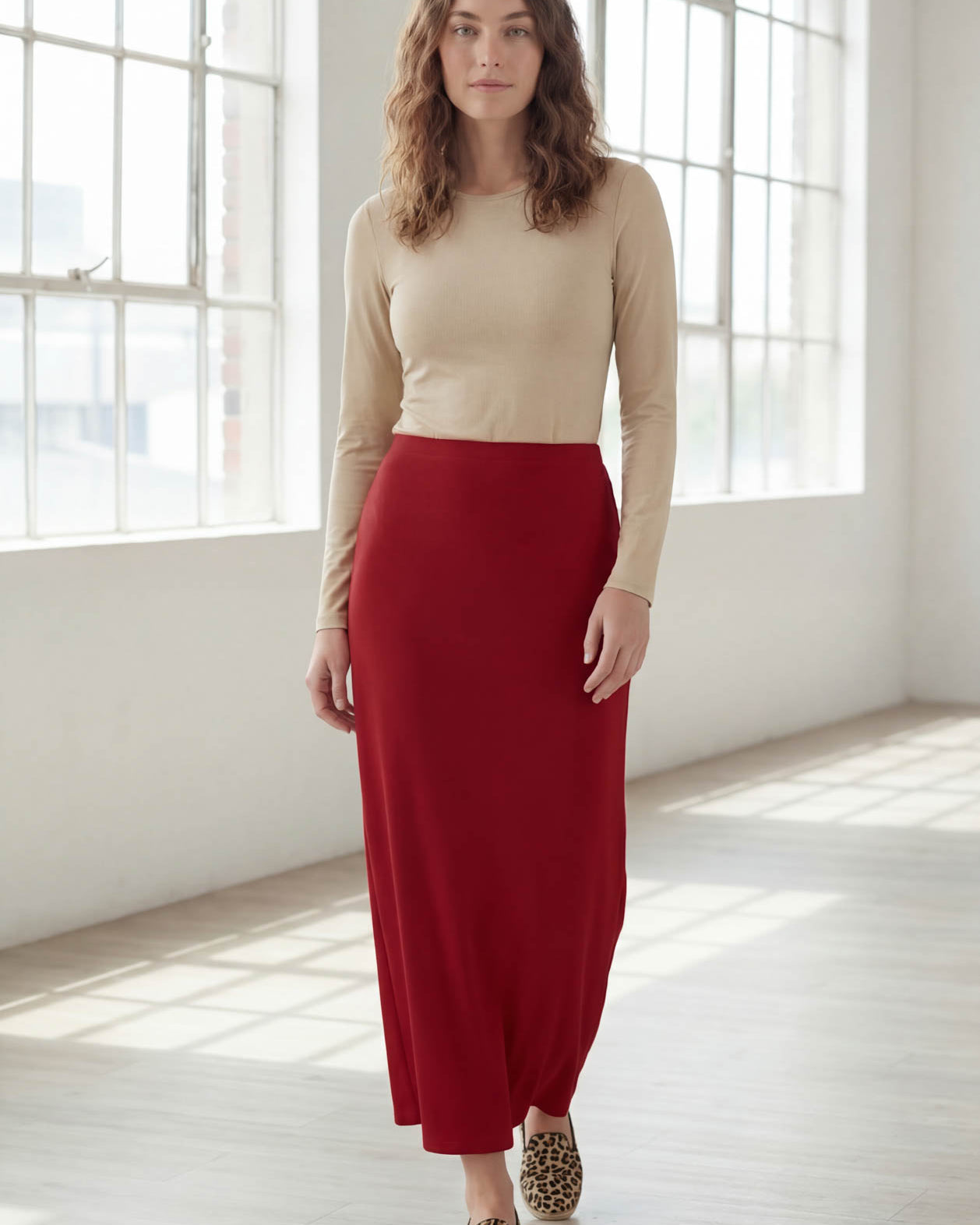 Model wearing Nuggles® 36" Classic Skirt in Brick Red