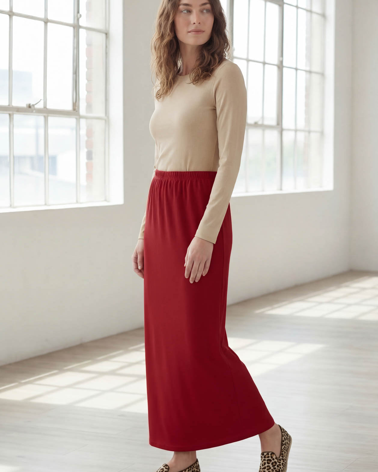 Model wearing Nuggles® 36" Classic Skirt in Brick Red