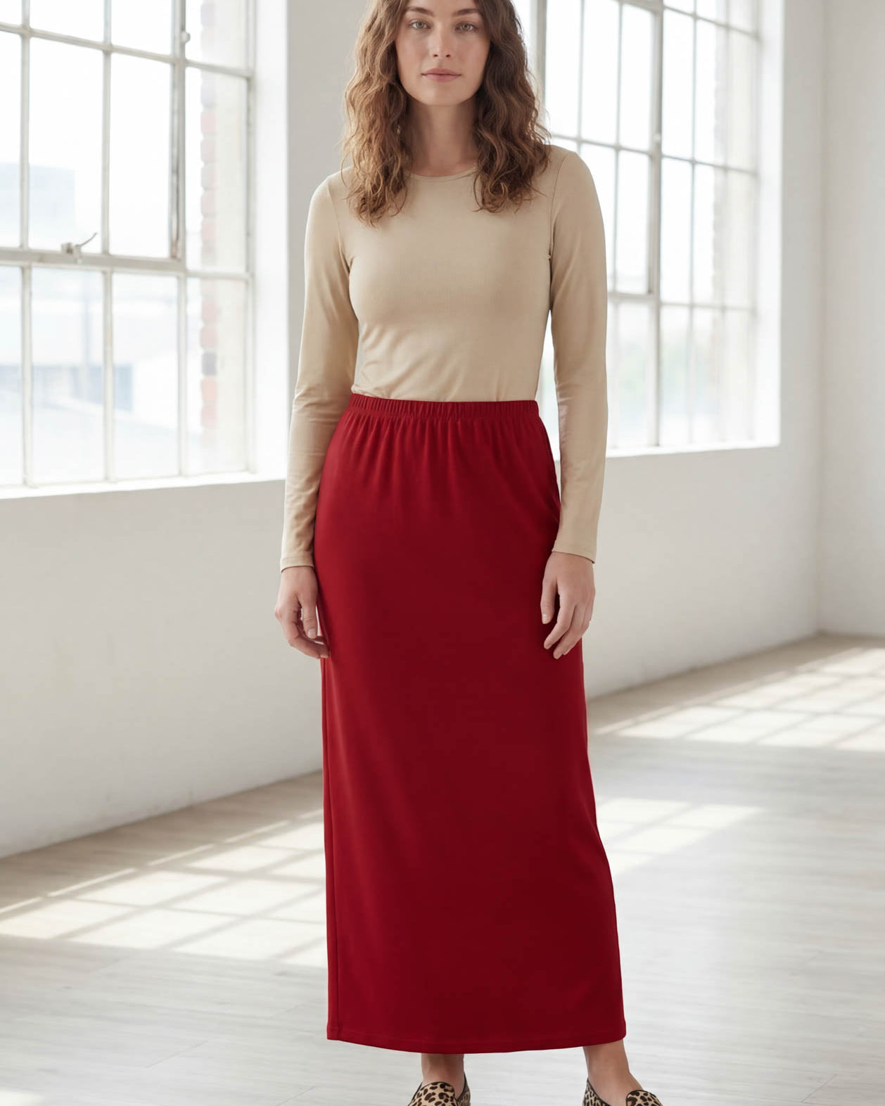 Model wearing Nuggles® 36" Classic Skirt in Brick Red