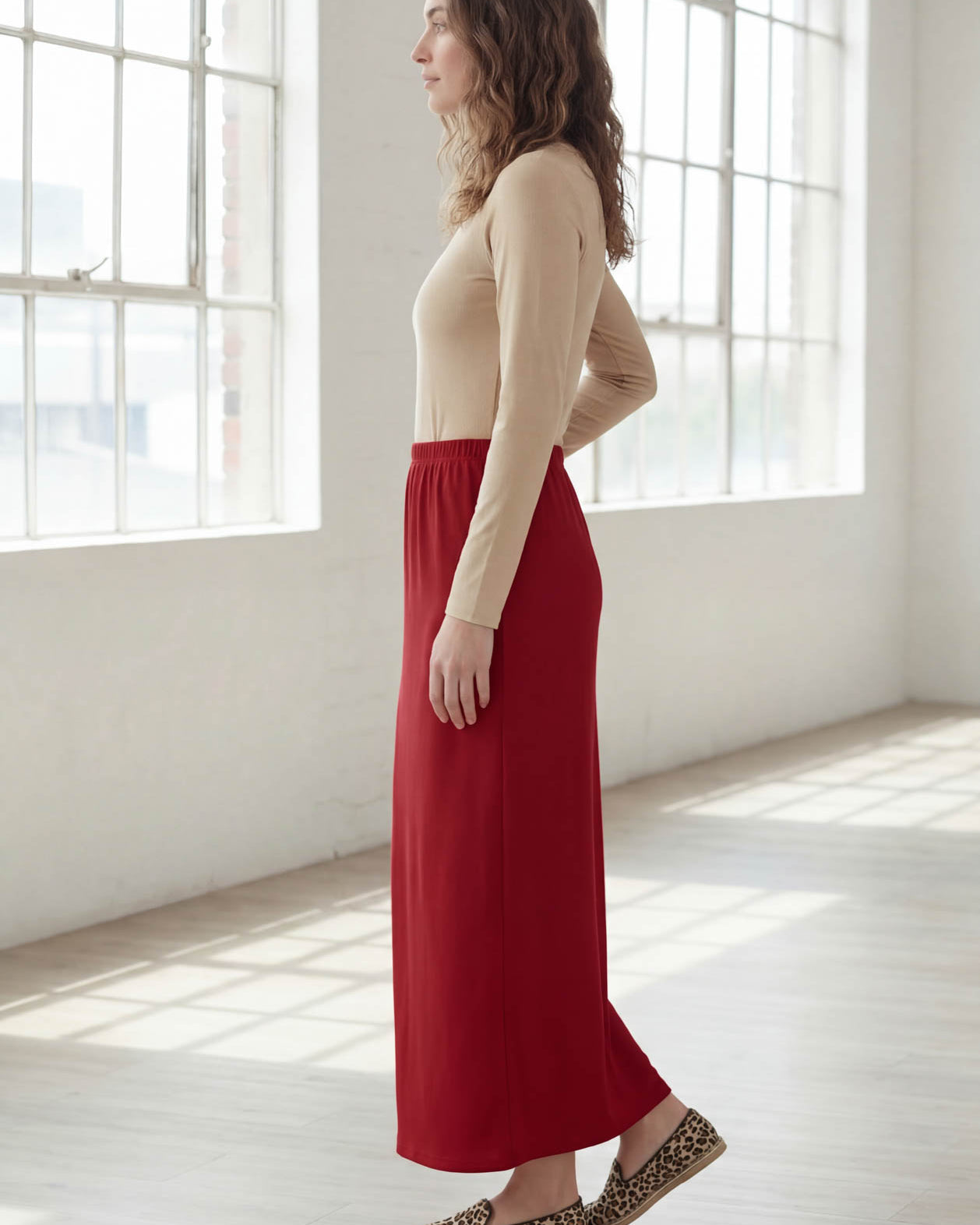 Model wearing Nuggles® 36" Classic Skirt in Brick Red