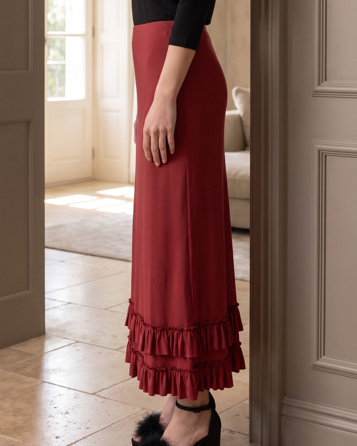 Model wearing Nuggles® Callie Skirt in Brick Red