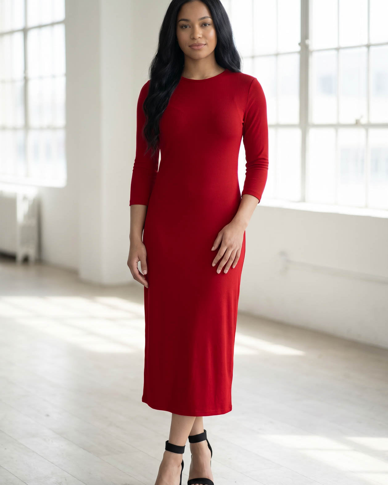 Model wearing Nuggles® Ribbed Layering Dress in Brick Red